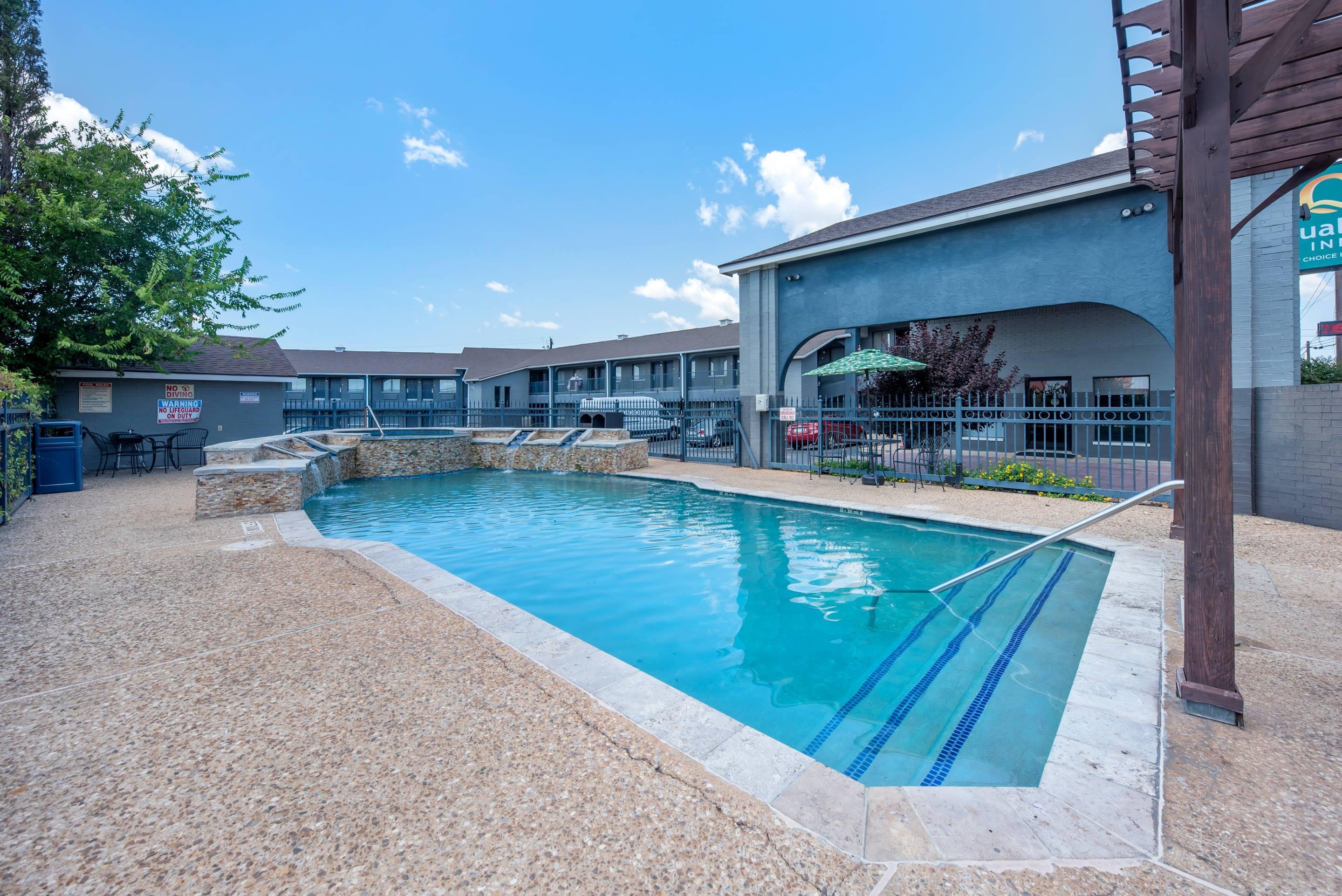 Outdoor pool | Quality Inn Near Lake Marble Falls