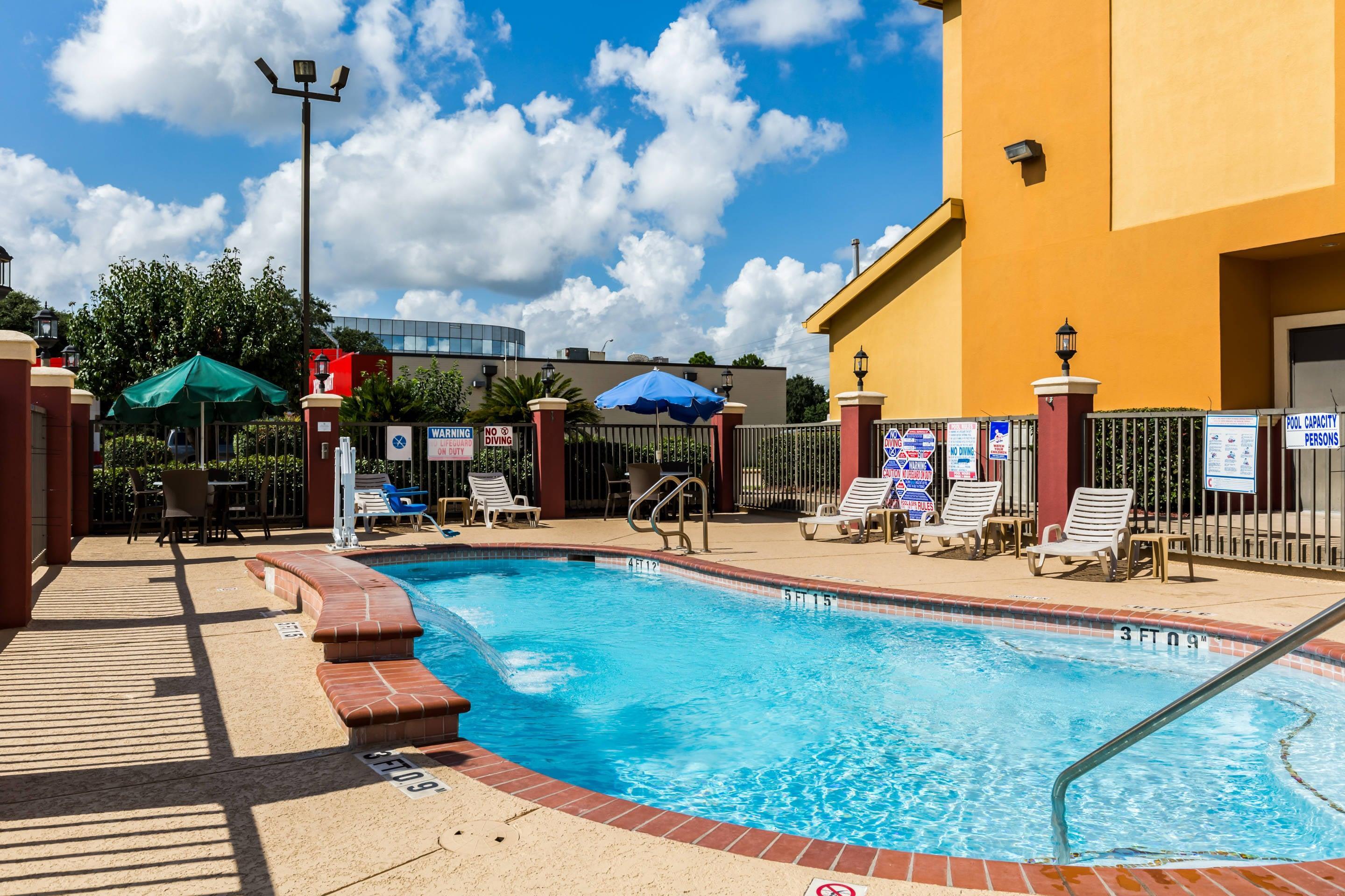 Relax by the pool | Comfort Suites Westchase Houston Energy Corridor