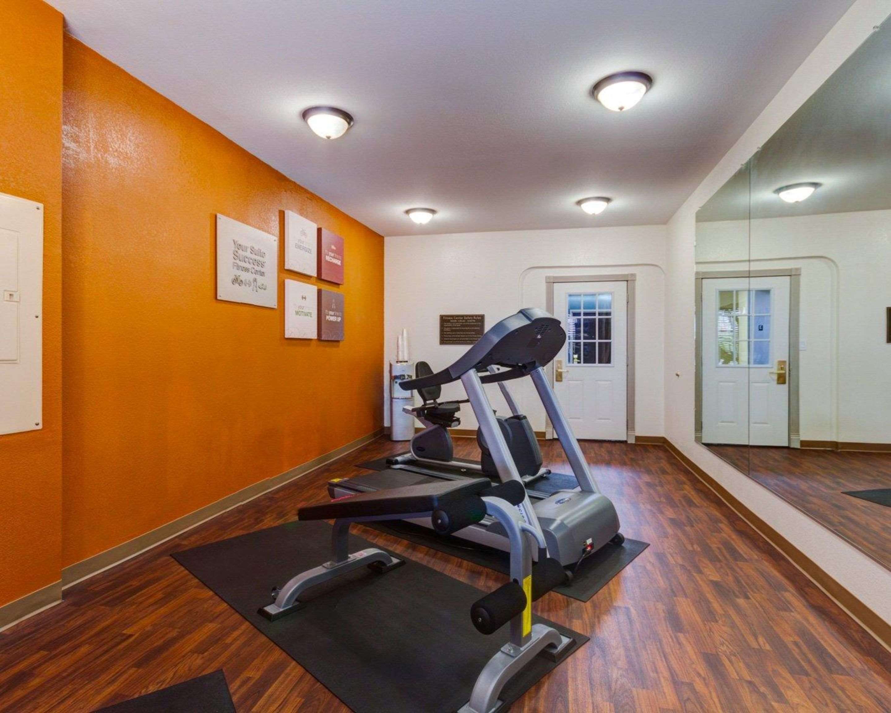 Fitness center with cardio equipment and weights