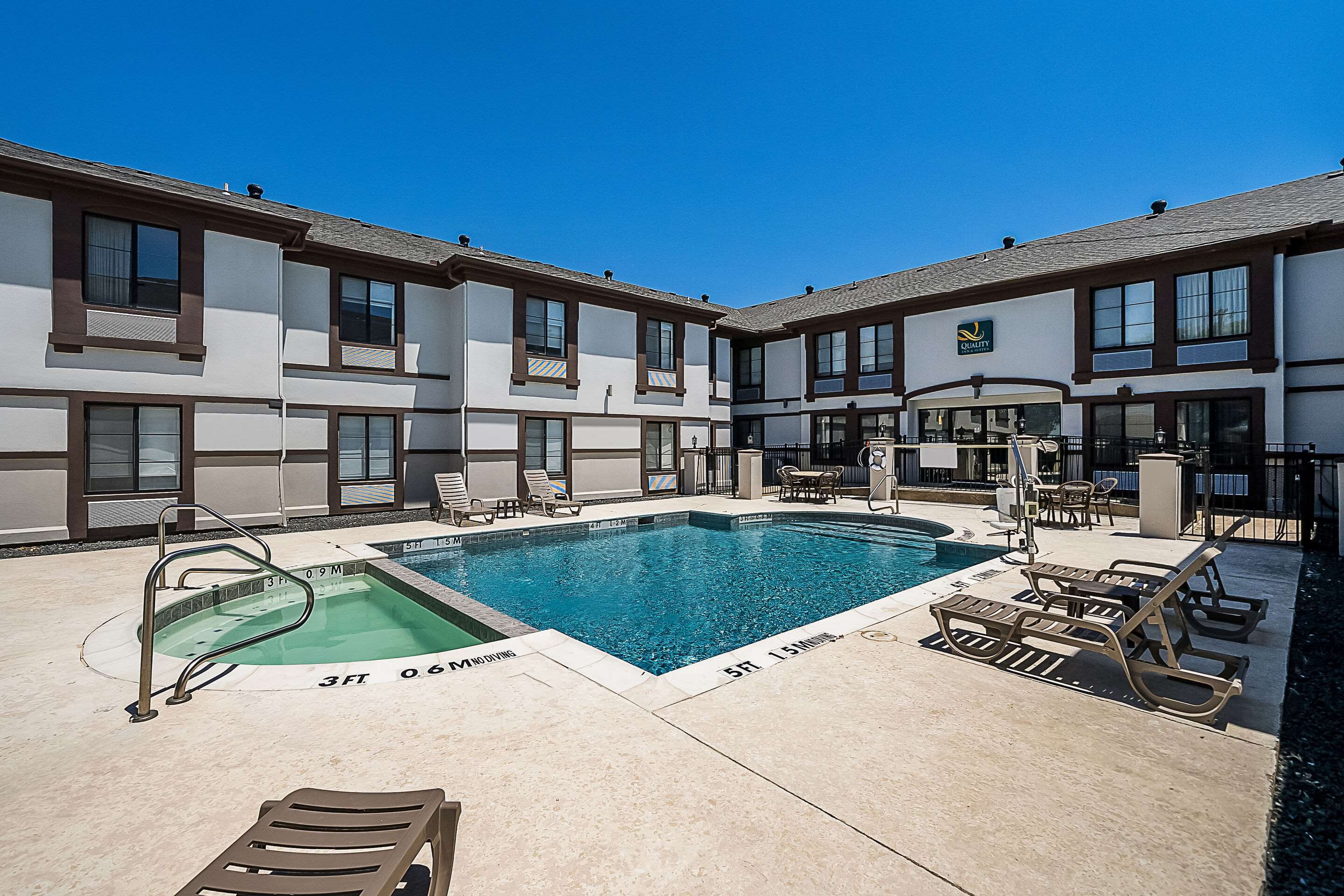 Outdoor pool | Quality Inn & Suites Irving DFW Airport South