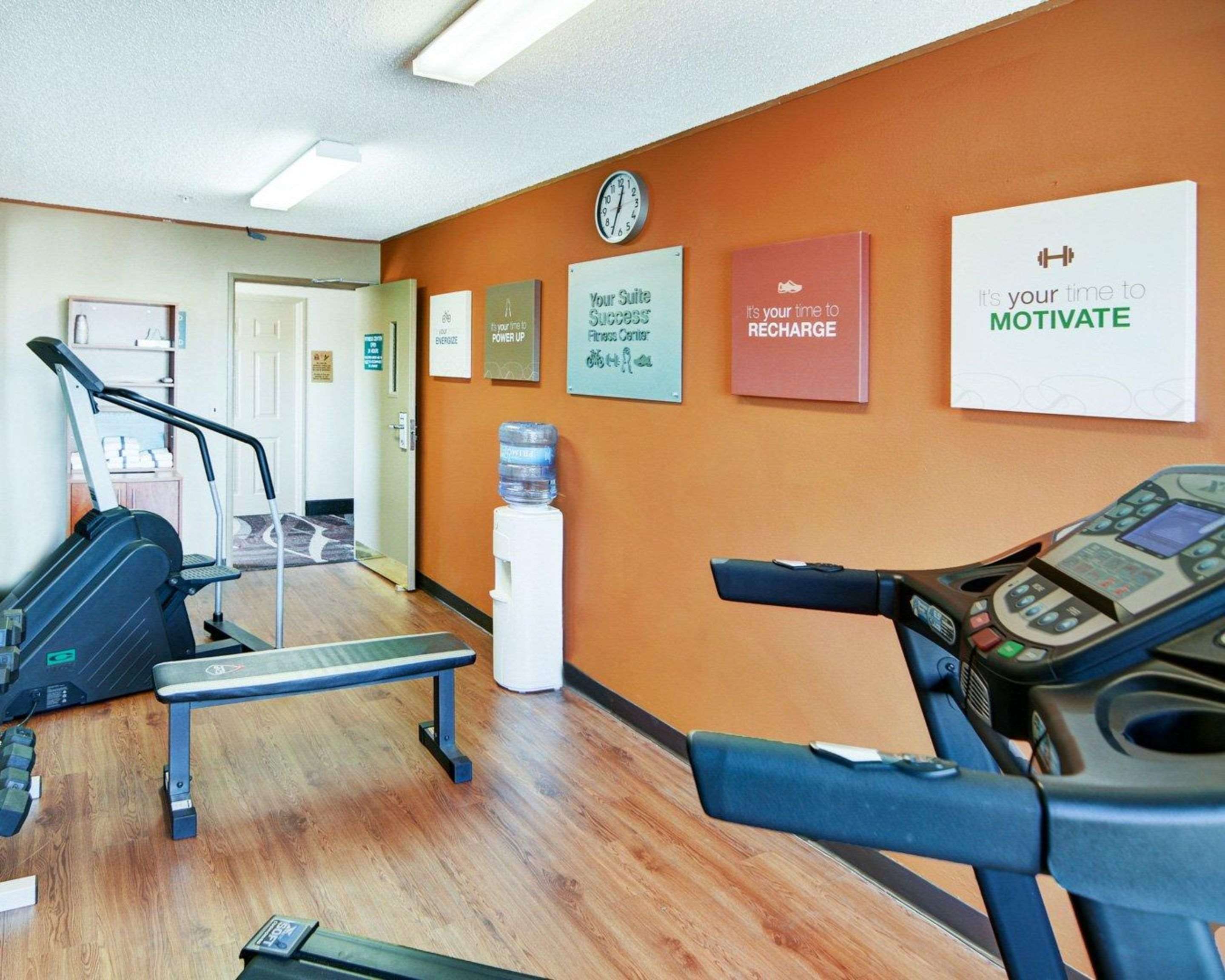 Fitness center with cardio equipment and weights