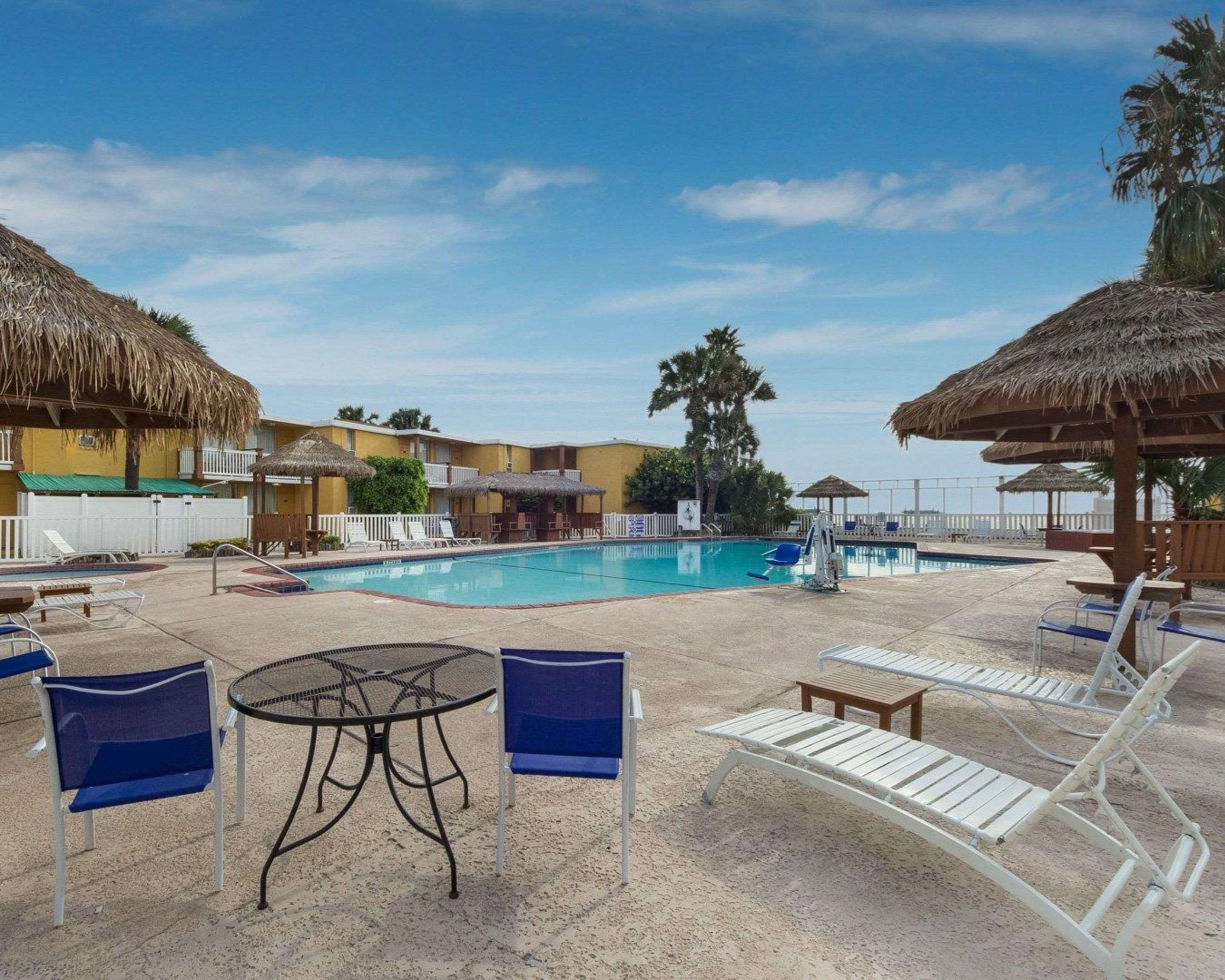 Outdoor pool with sundeck | Quality Inn & Suites Corpus Christi