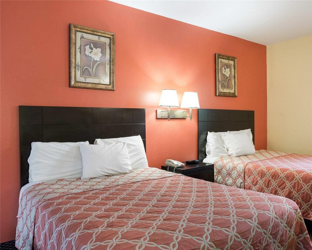 RODEWAY INN AND SUITES HUMBLE IAH-guestroom-Guest Room,On-Site.jpg