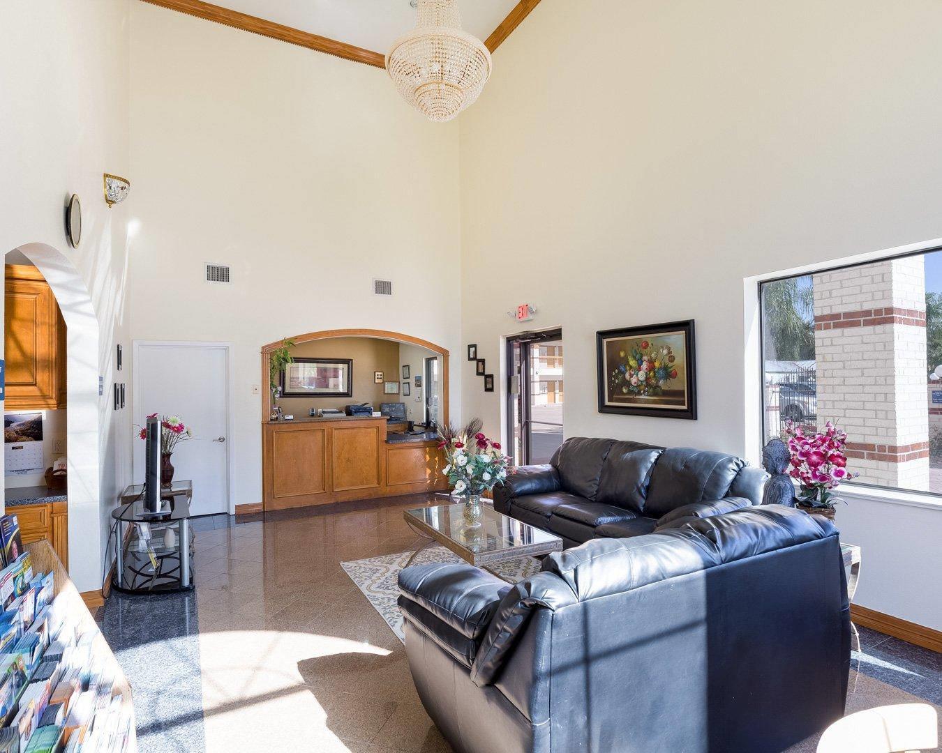 Spacious lobby with sitting area | Rodeway Inn & Suites Humble, TX
