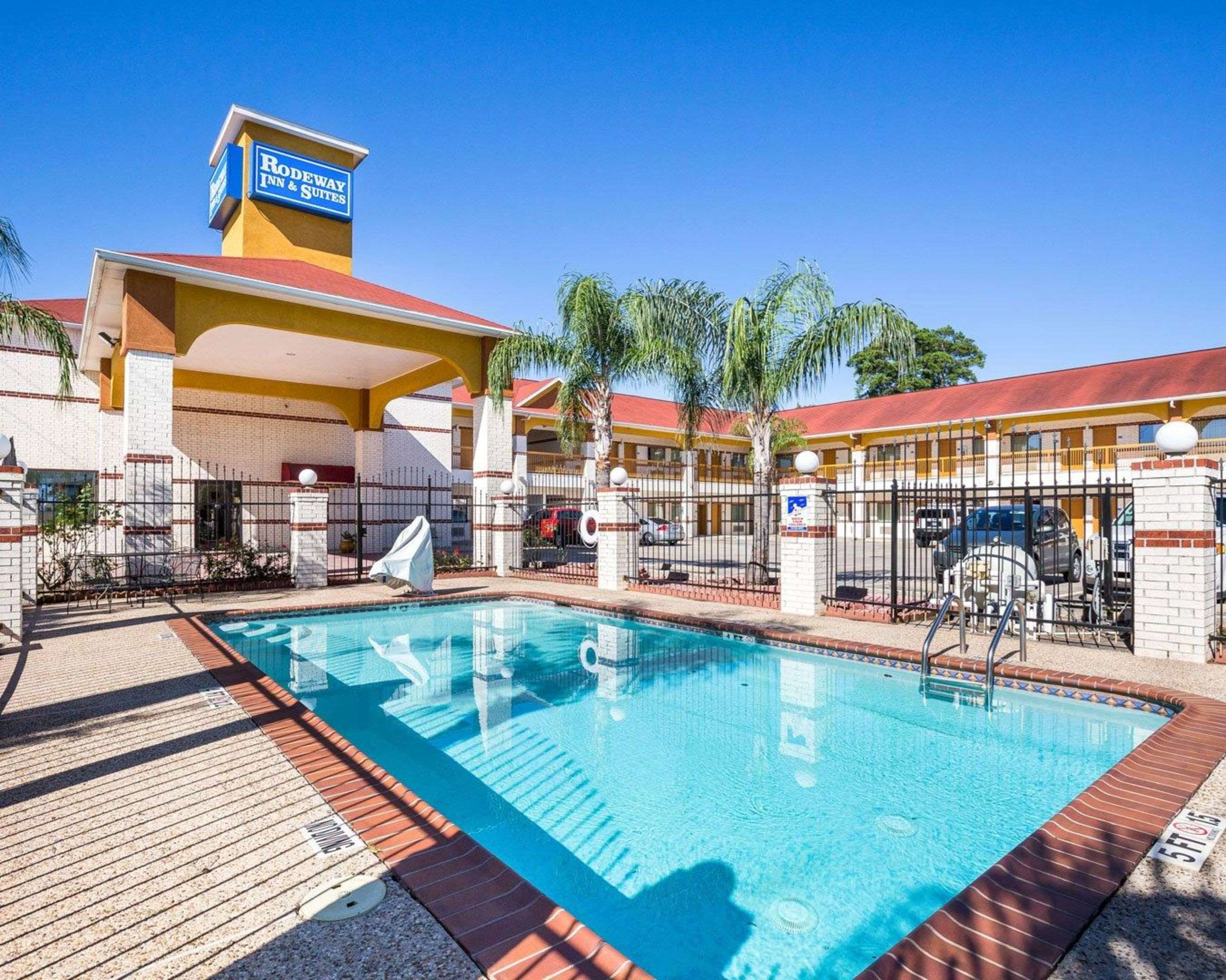 Outdoor pool | Rodeway Inn & Suites Humble, TX