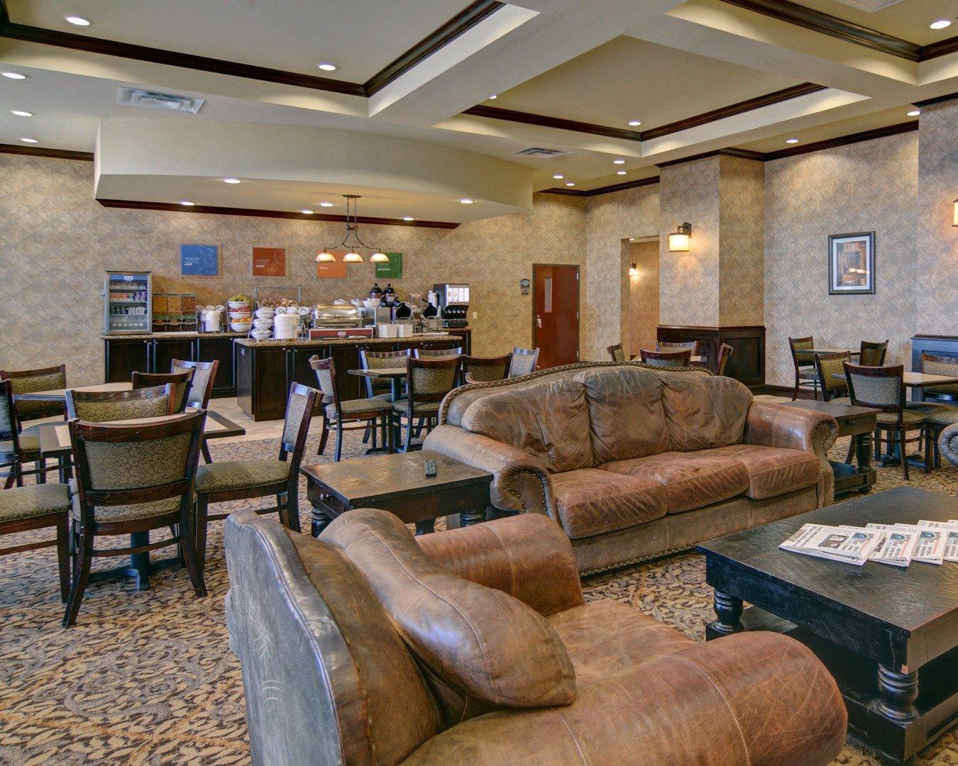 Enjoy breakfast in this seating area | Comfort Suites Frisco