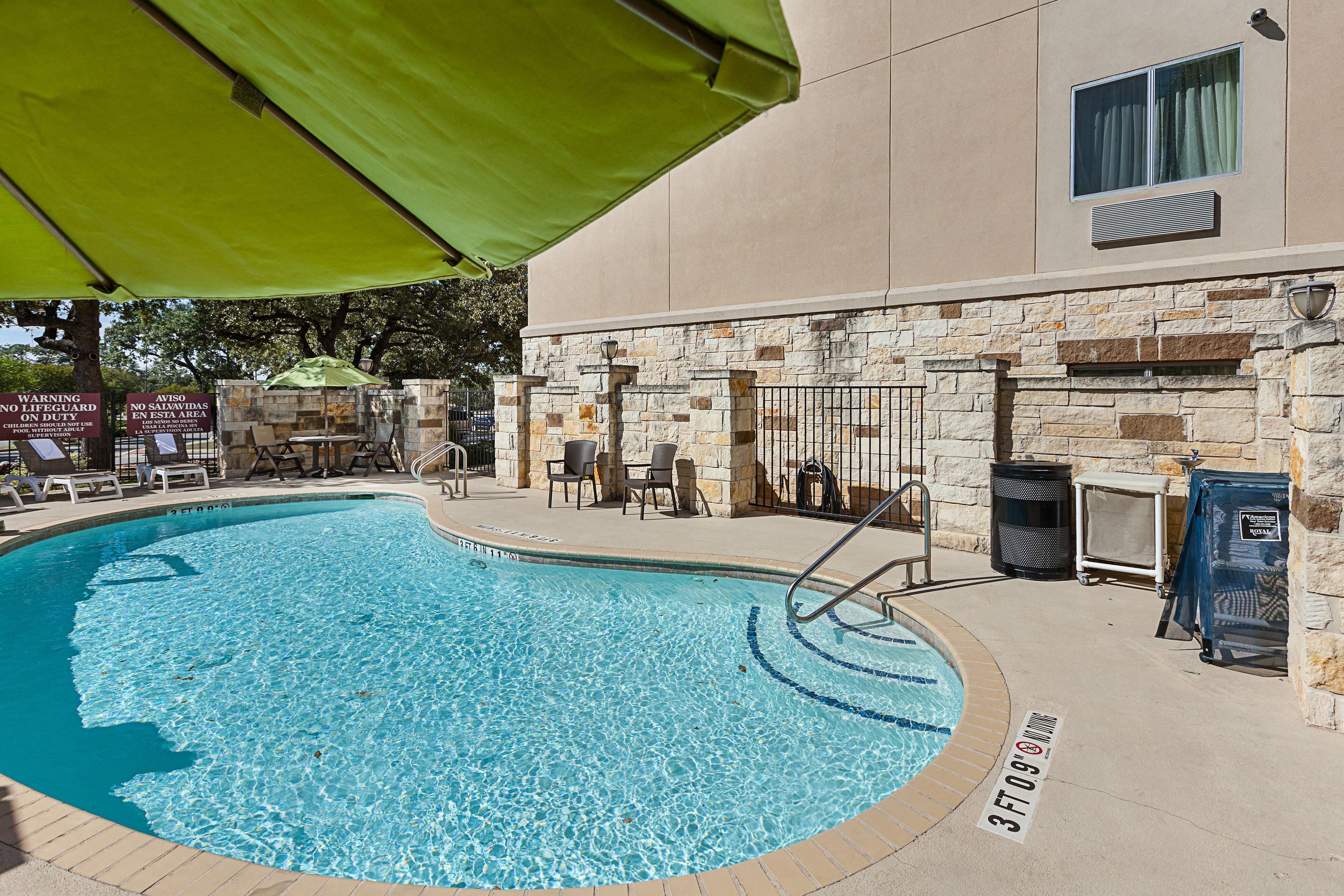 Outdoor pool | Comfort Suites San Antonio North - Stone Oak