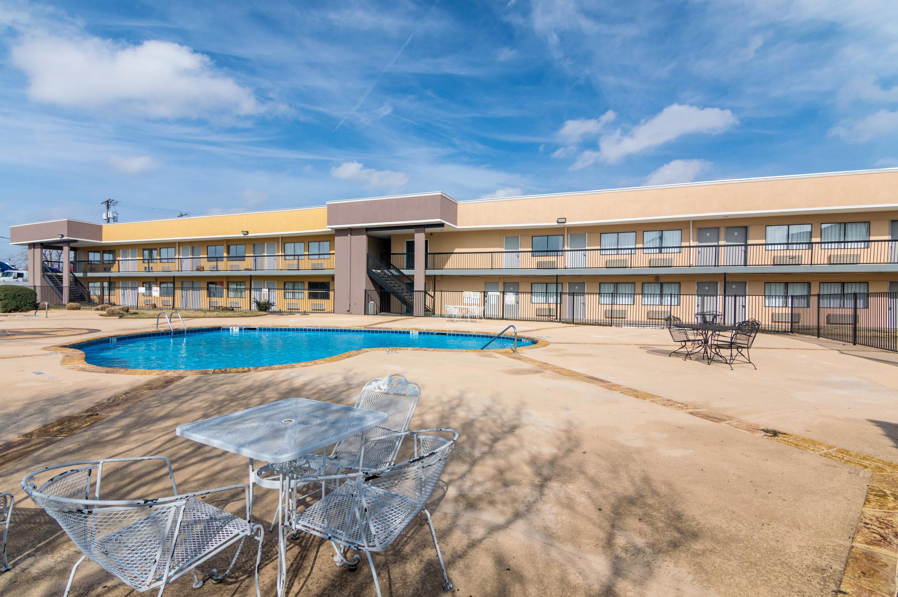 Outdoor pool | Rodeway Inn Arlington
