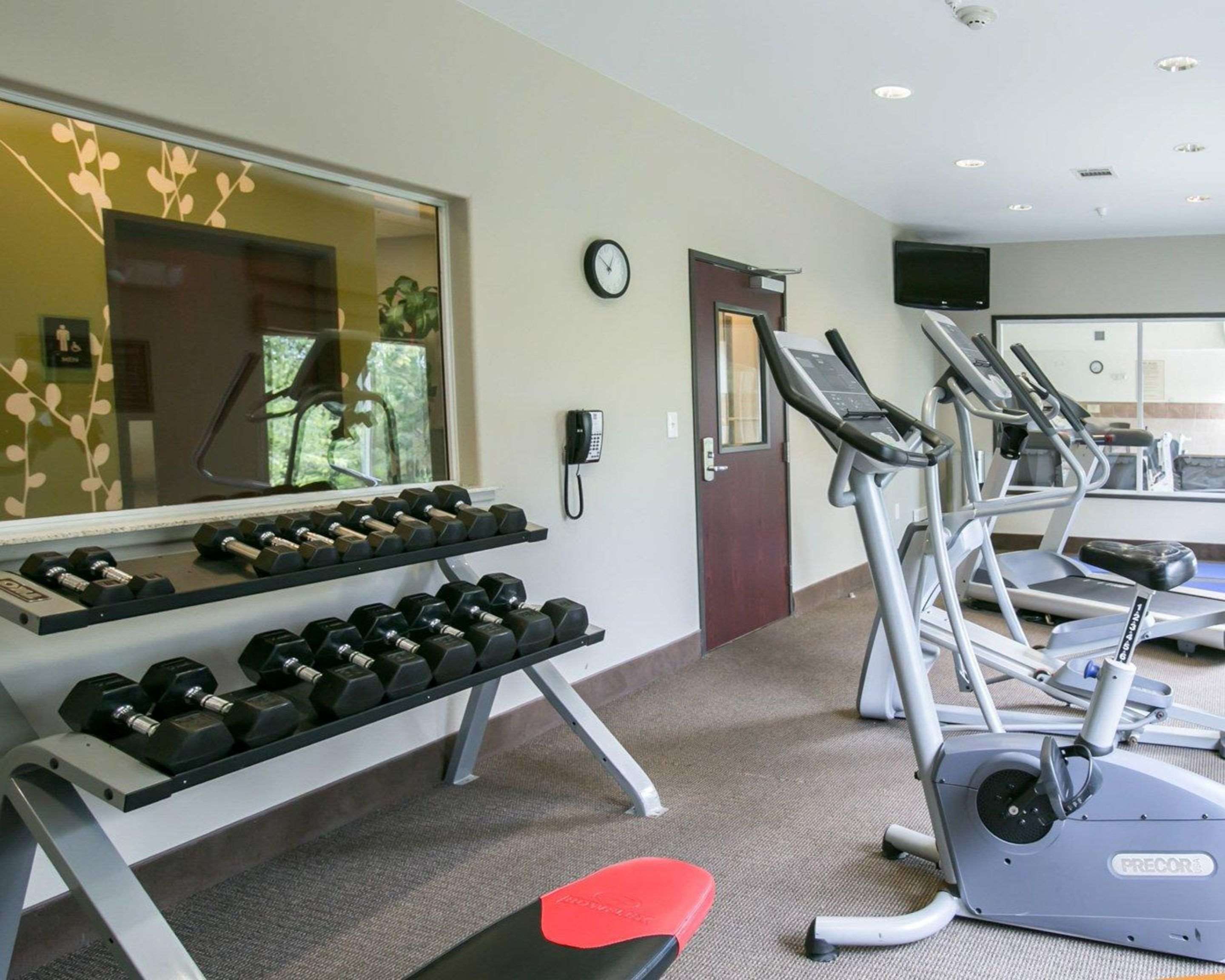 Fitness center with cardio equipment and weights