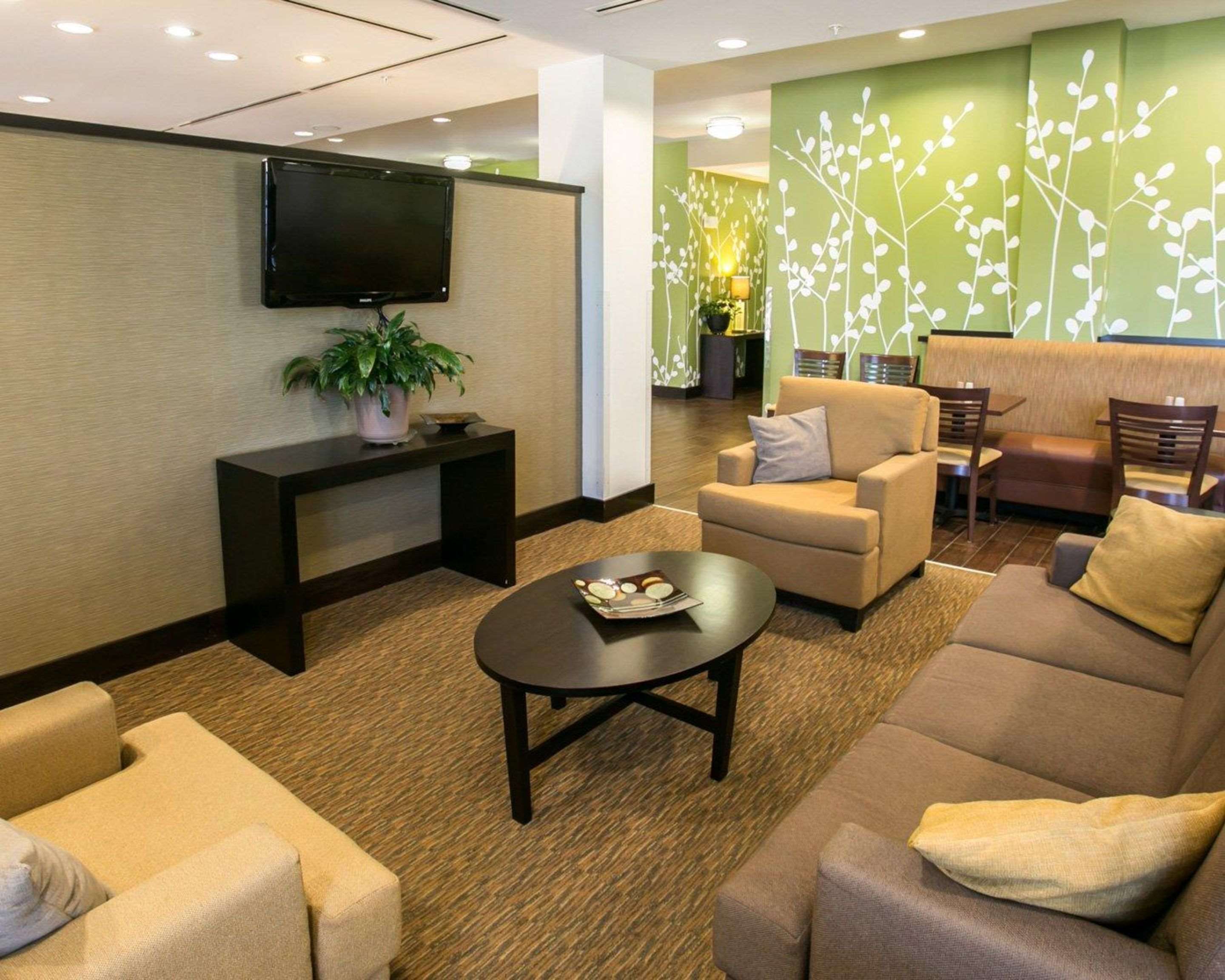 Spacious lobby with sitting area | Sleep Inn & Suites