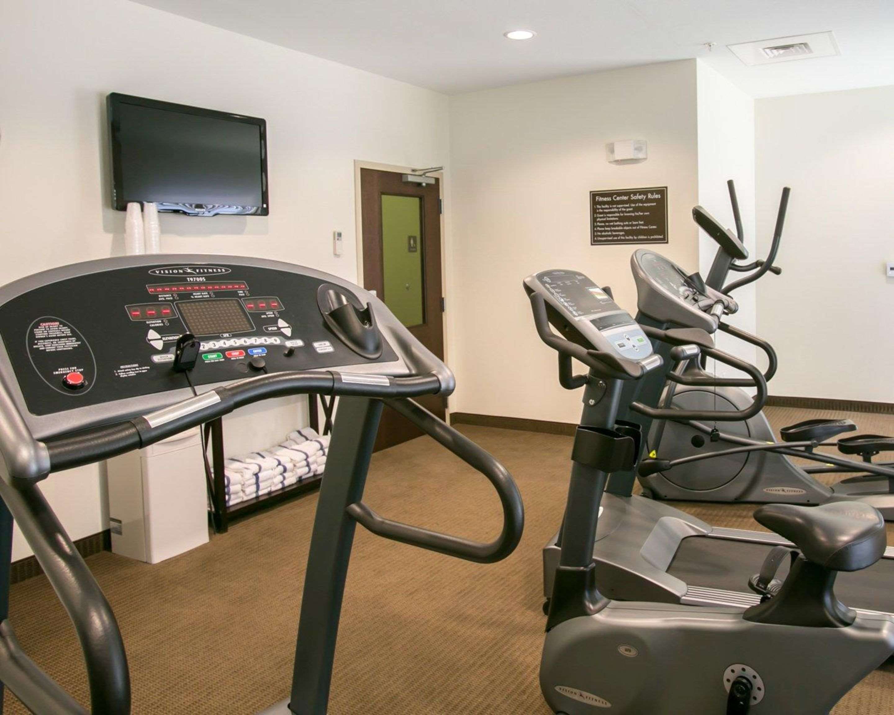 Exercise room with cardio equipment | Sleep Inn & Suites