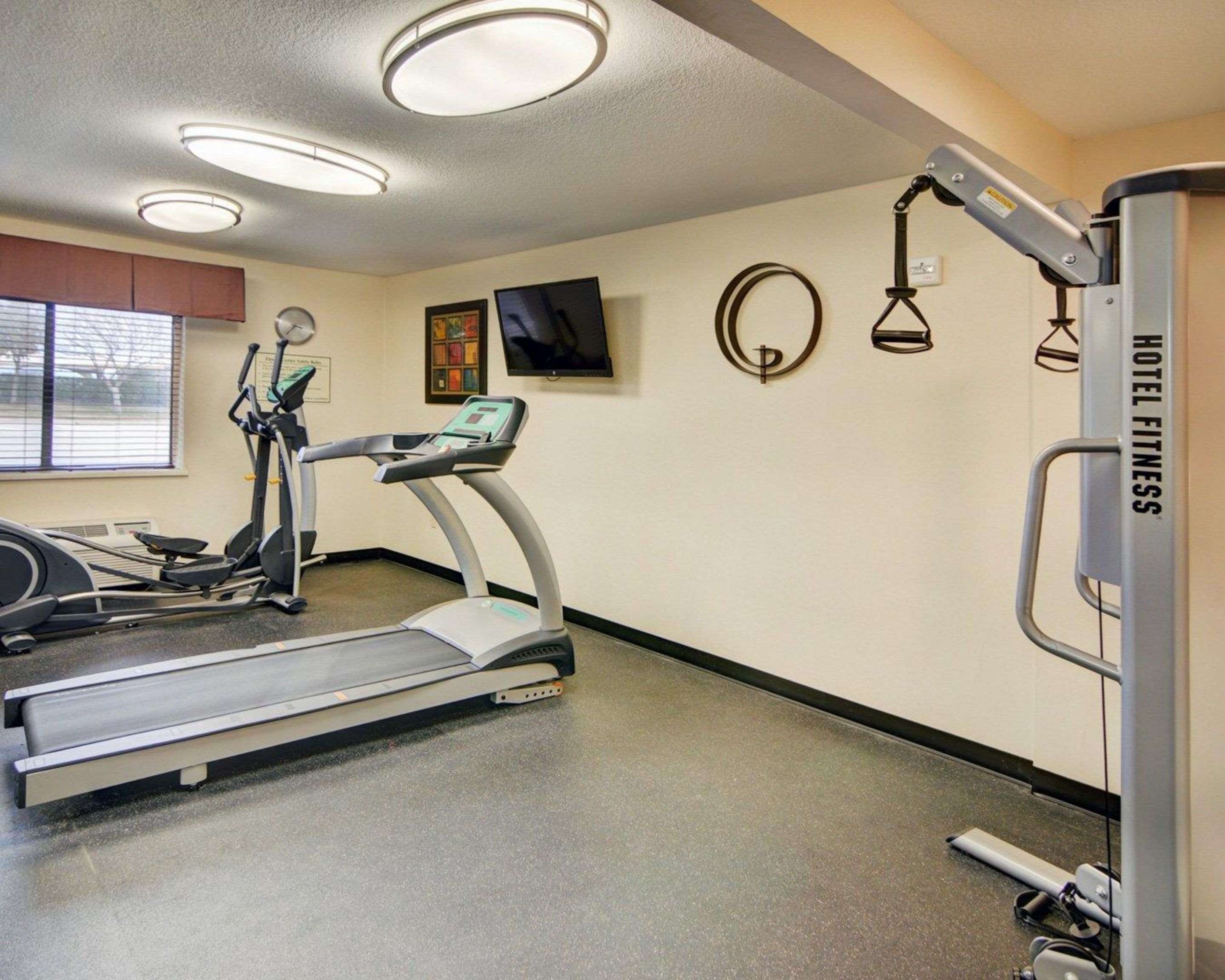 Fitness center with cardio equipment and weights | Comfort Inn Grapevine Near DFW Airport