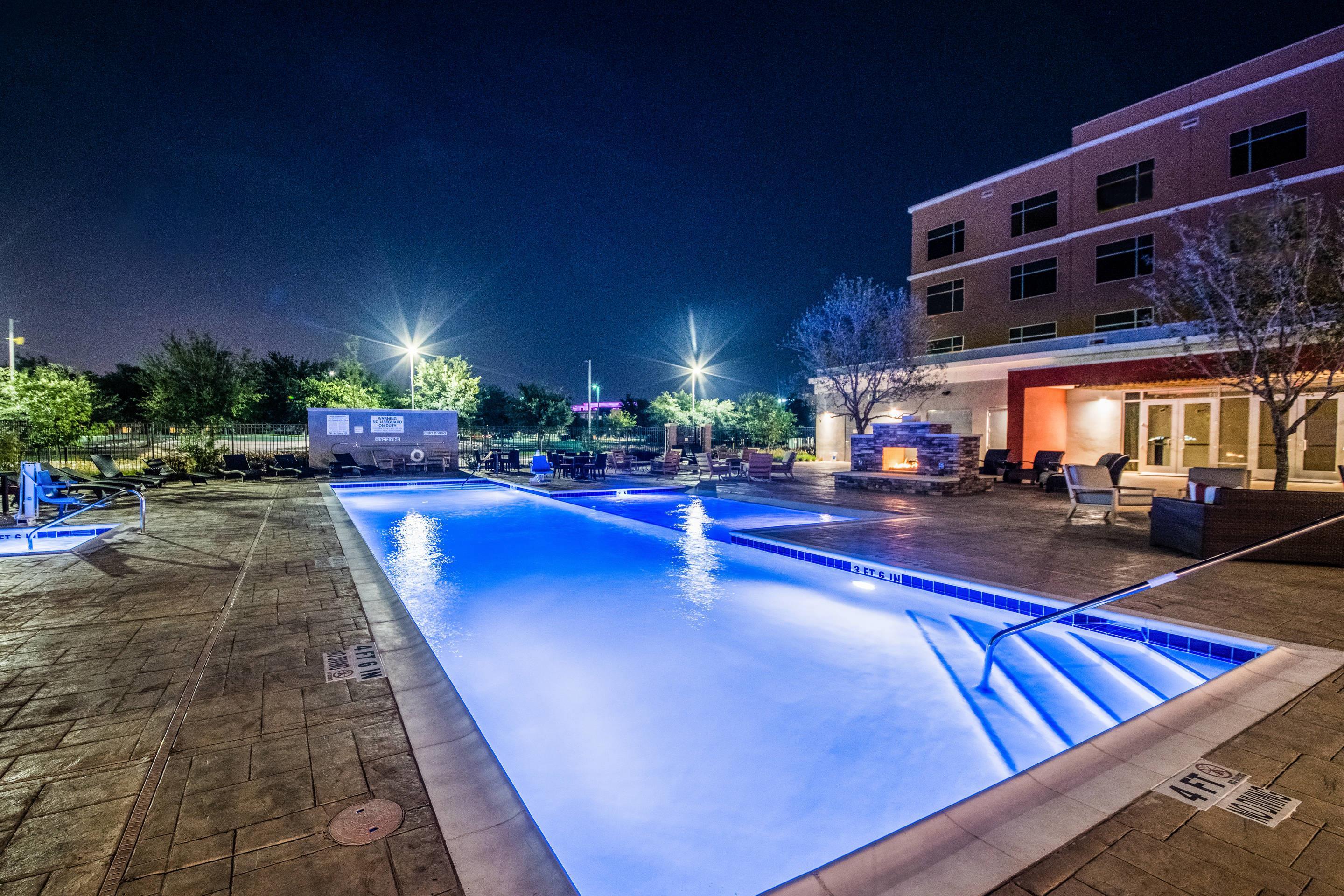 Hotel pool at night | Cambria Hotel McAllen Convention Center