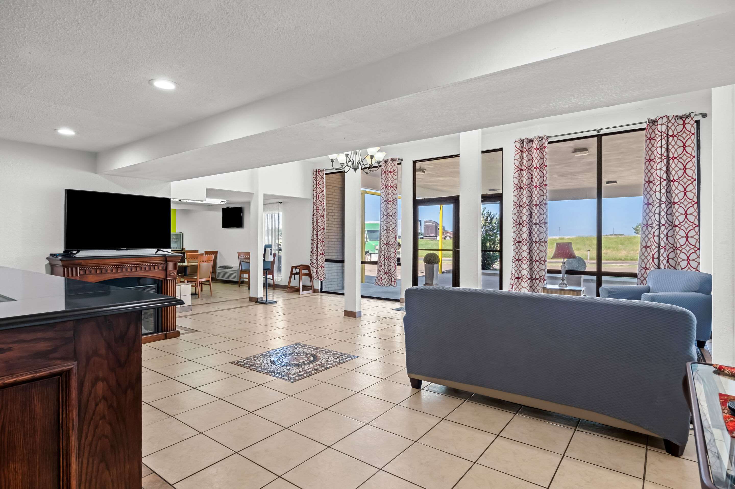 Spacious lobby with sitting area | Quality Inn & Suites