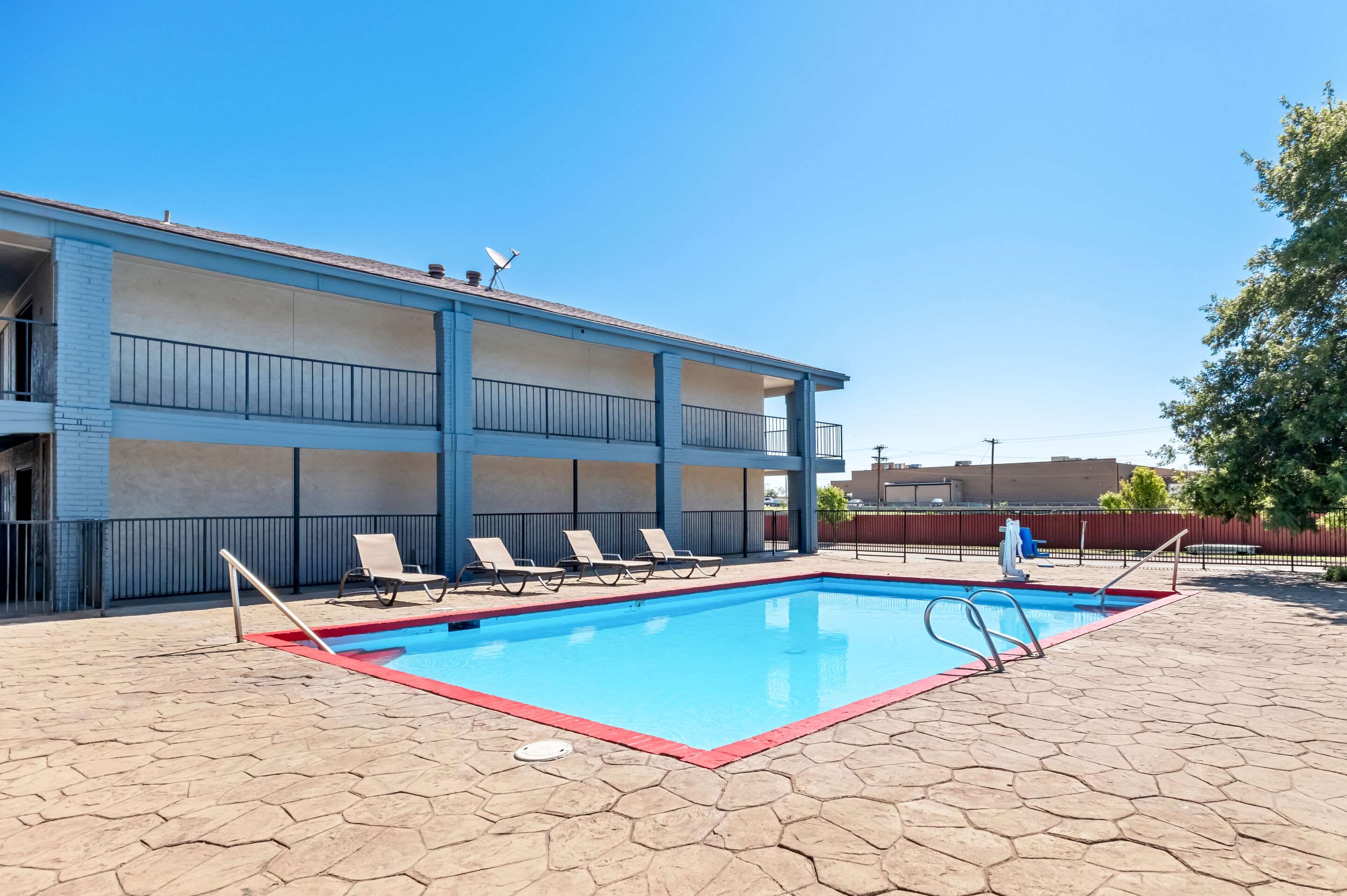 Outdoor pool | Quality Inn & Suites