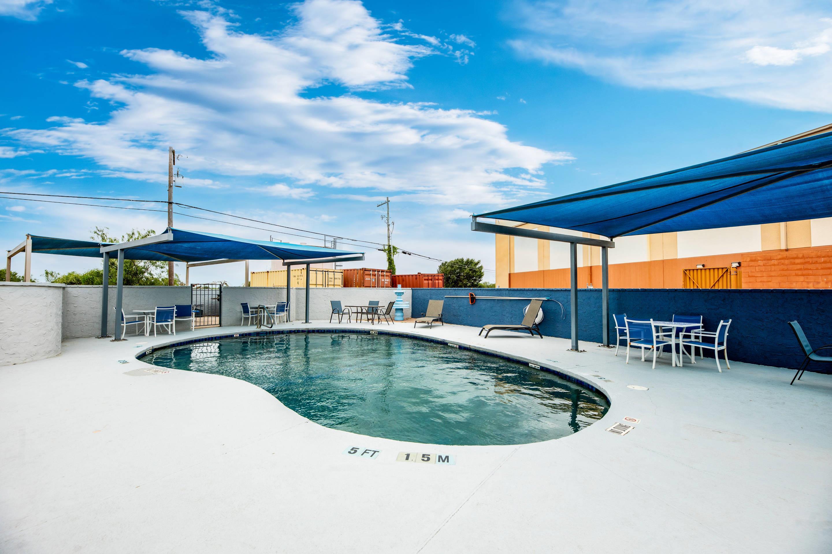 Relax by the pool | Quality Inn & Suites