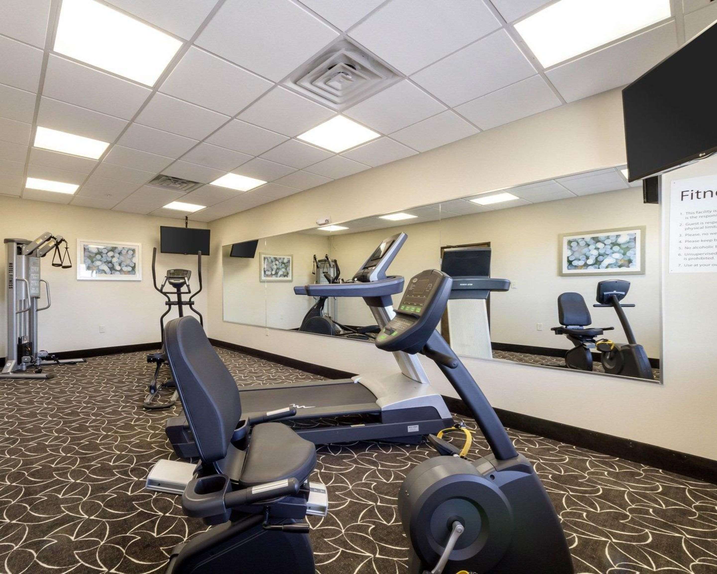 Fitness center with cardio equipment | Quality Inn & Suites Victoria East