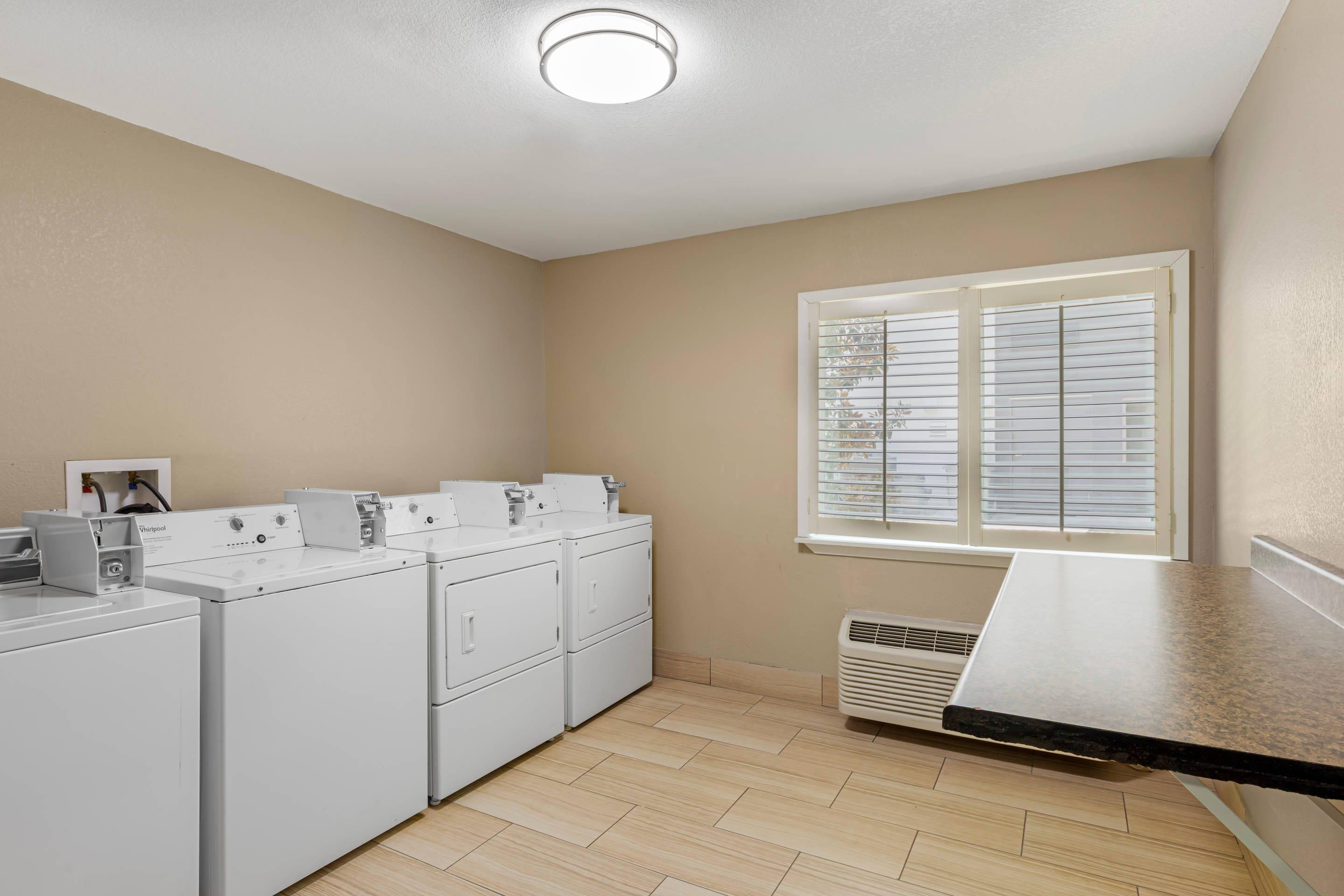 Guest laundry facilities | Quality Inn & Suites Plano