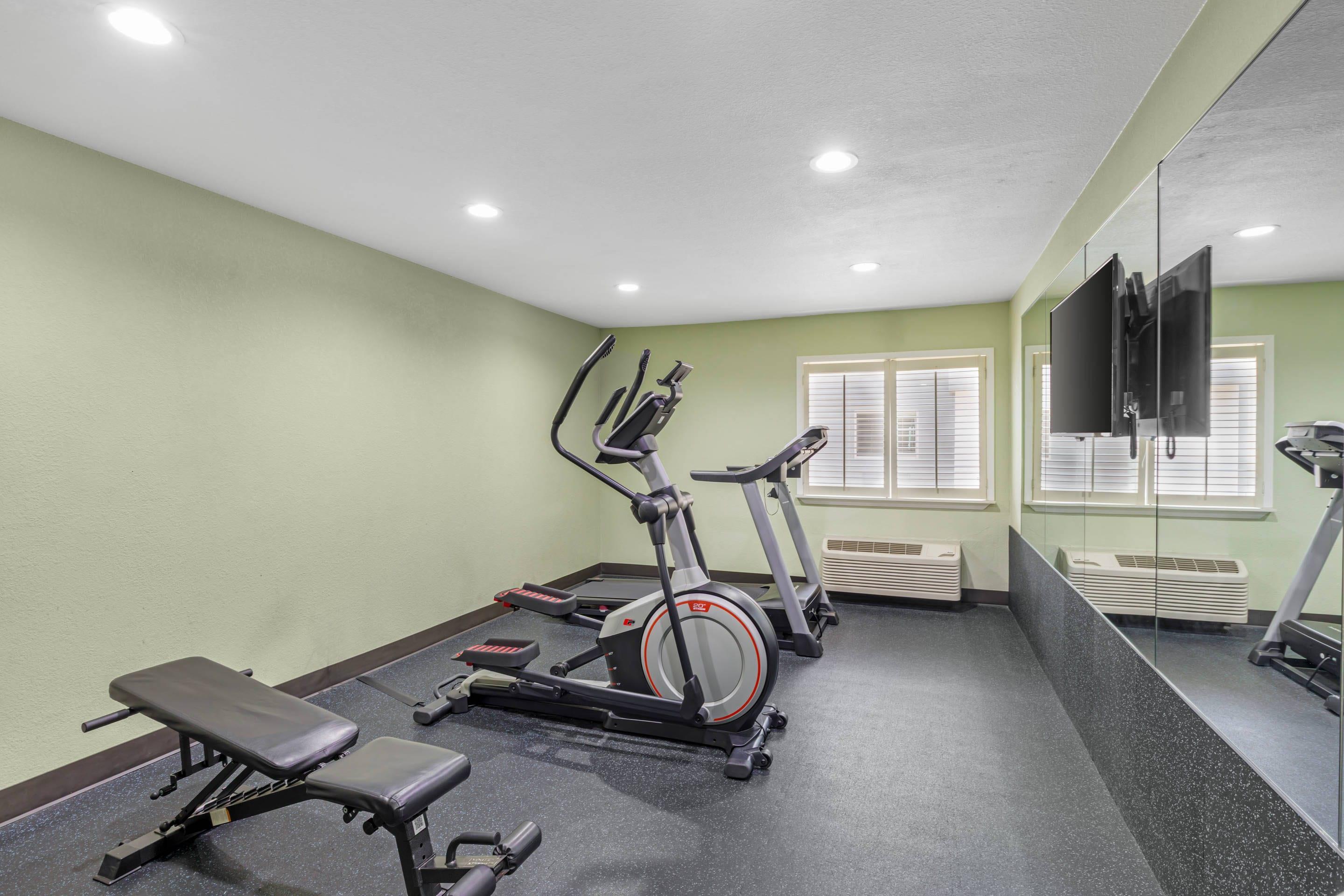 Fitness center | Quality Inn & Suites Plano