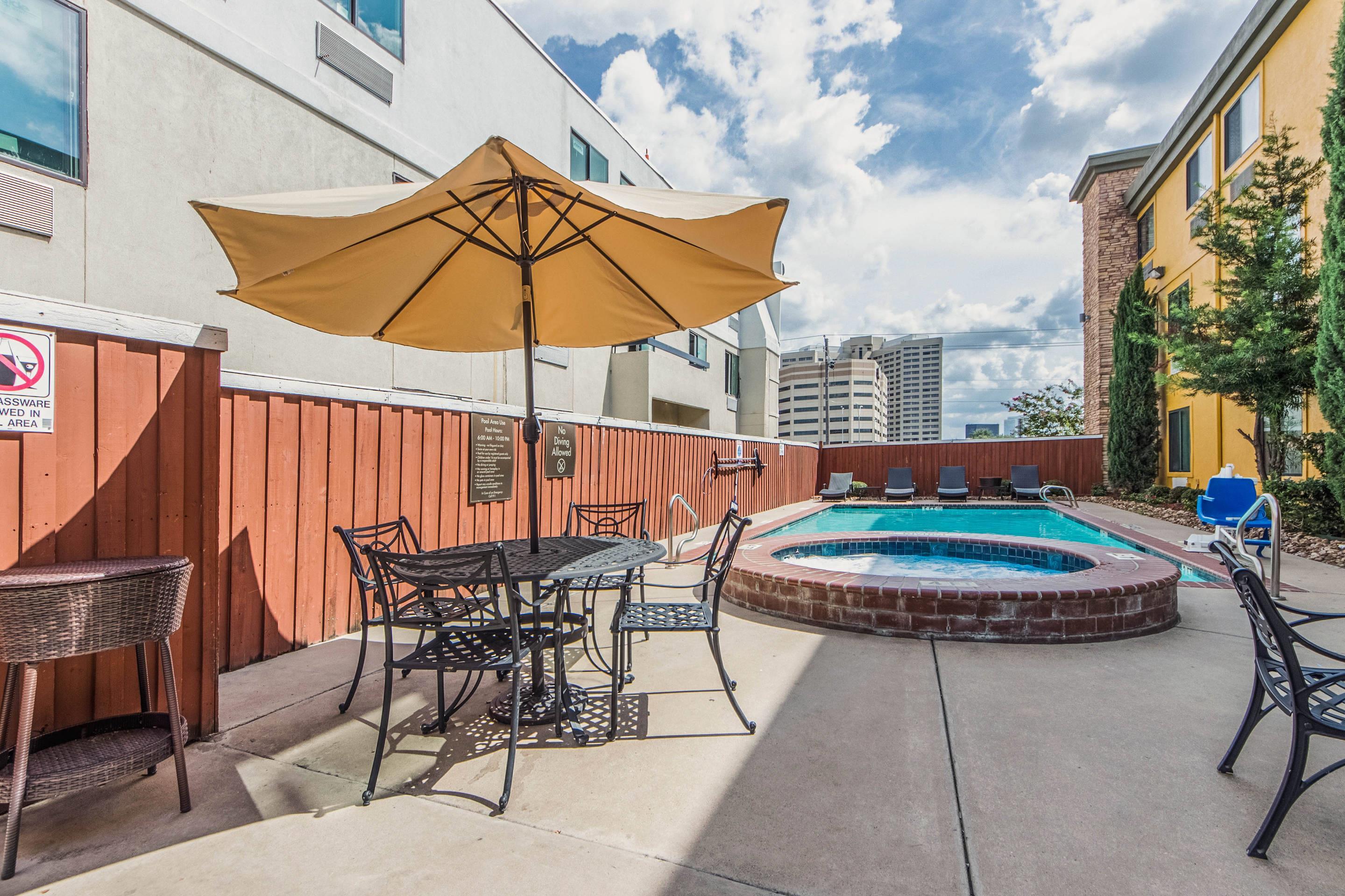 Relax by the pool | Comfort Inn Dallas Park Central