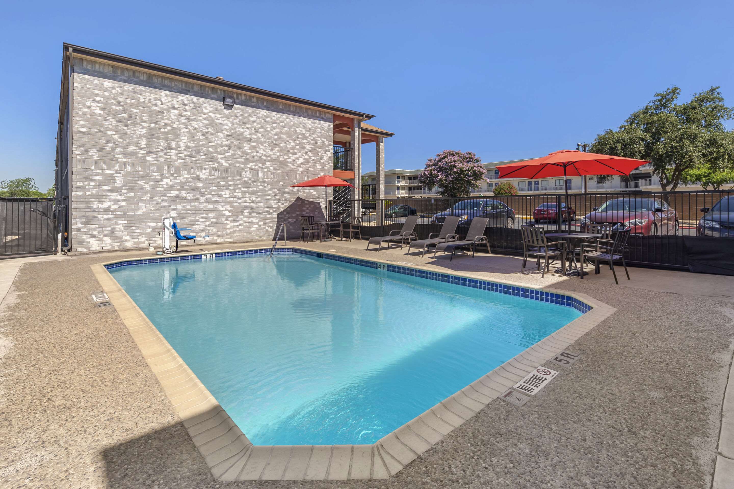Relax by the pool | Econo Lodge Near Lackland Air Force Base-SeaWorld
