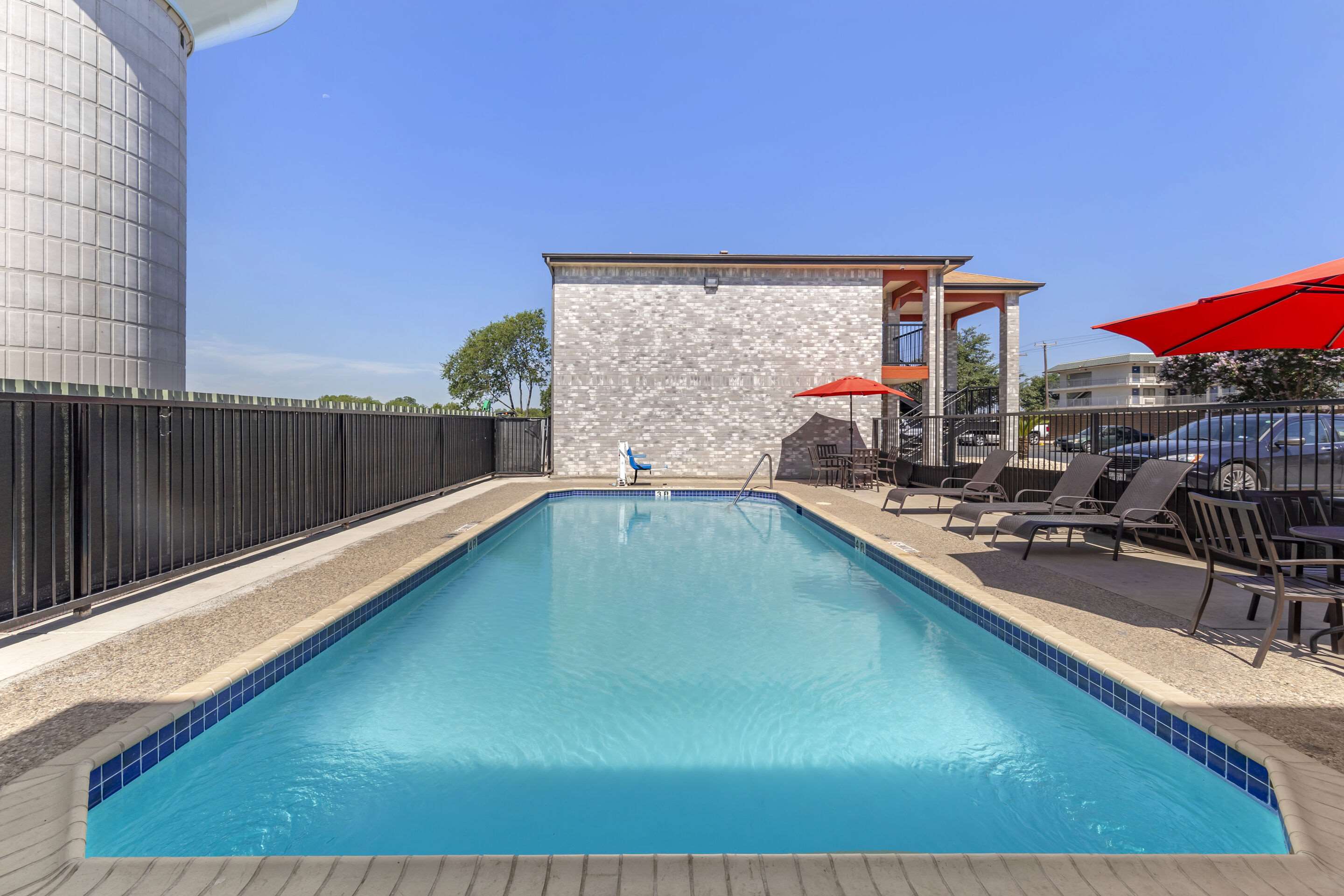 Relax by the pool | Econo Lodge Near Lackland Air Force Base-SeaWorld