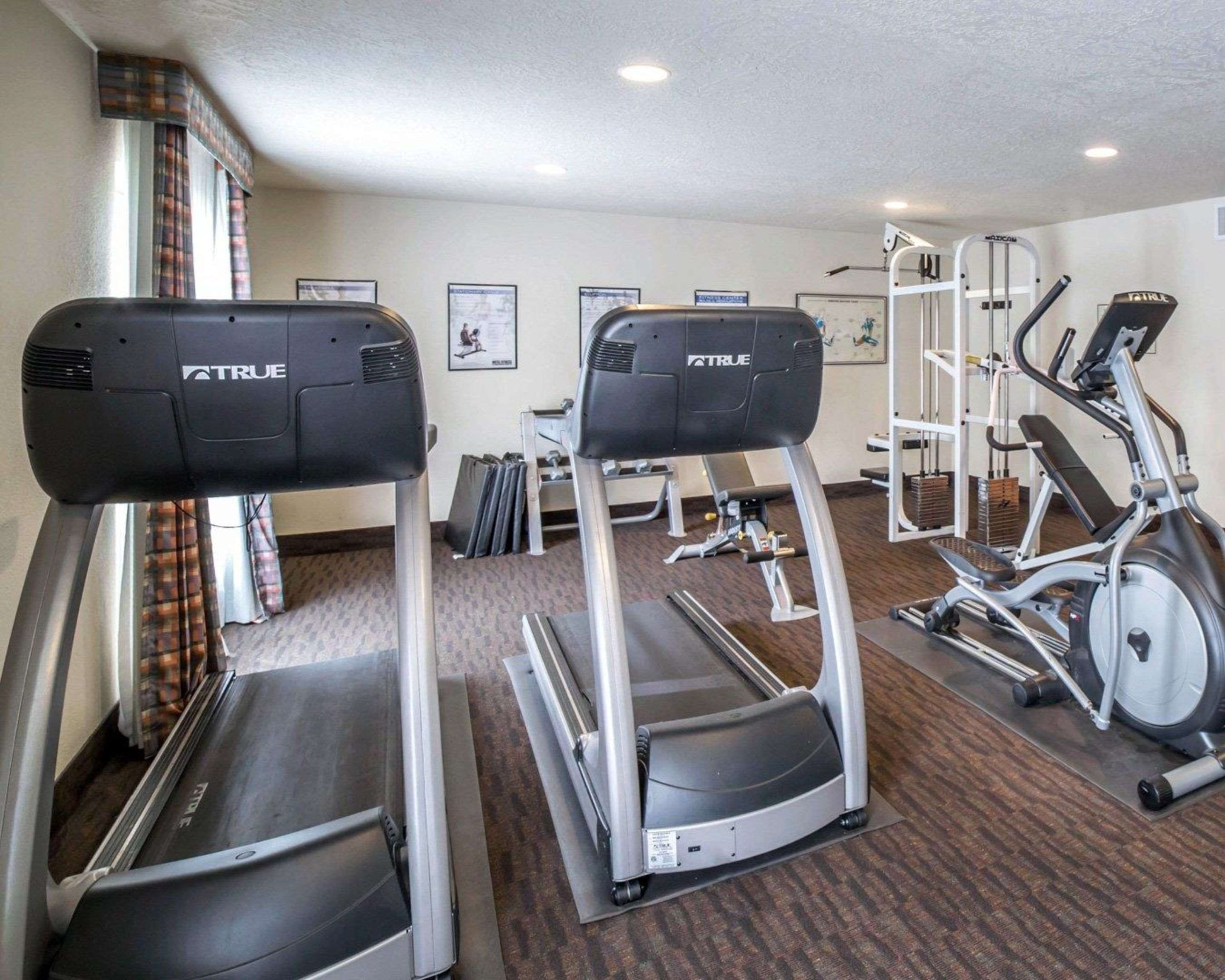 Exercise room with cardio equipment | Comfort Inn Downtown