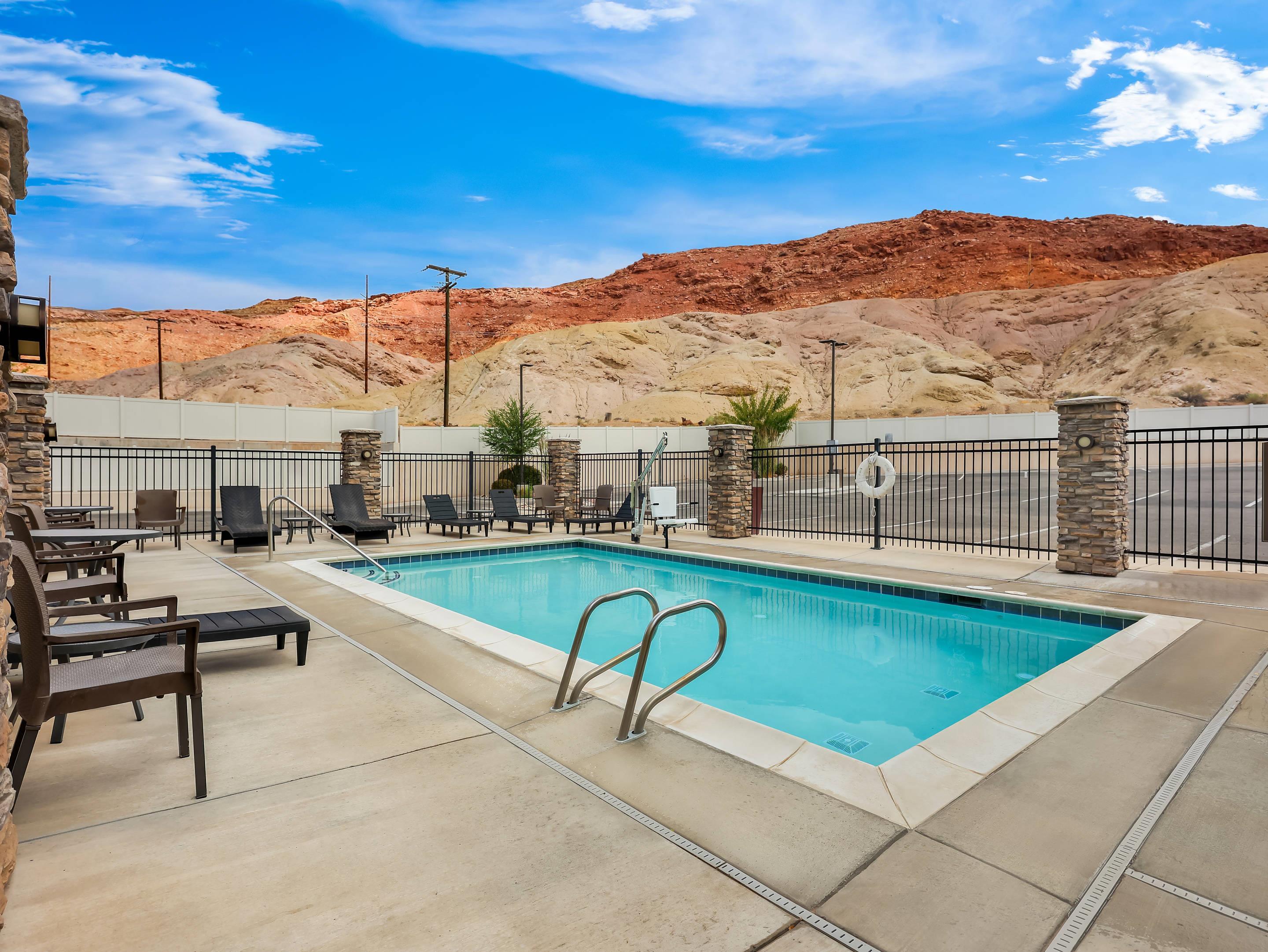 Outdoor pool | Comfort Suites Moab near Arches National Park