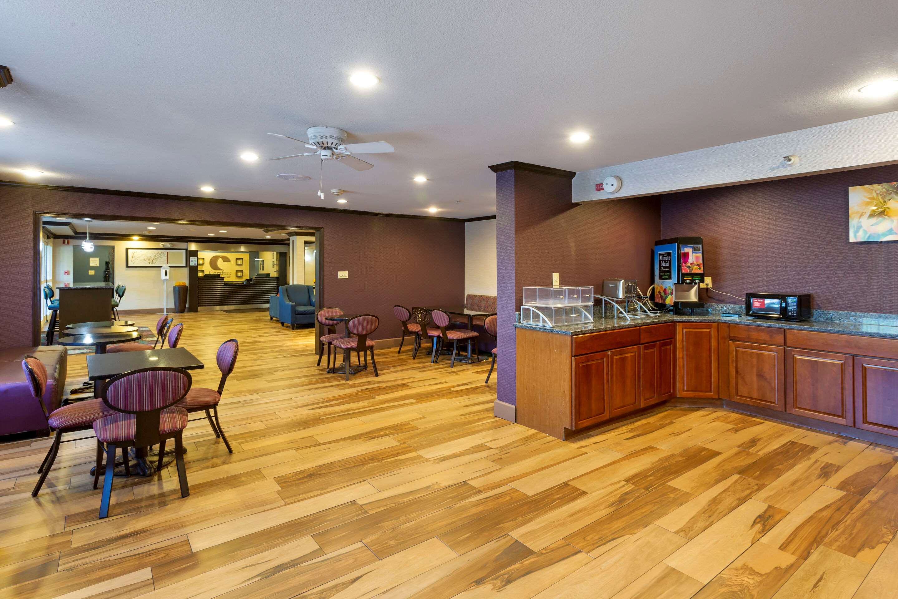 Enjoy breakfast in this seating area | Comfort Inn West Valley Salt Lake City South