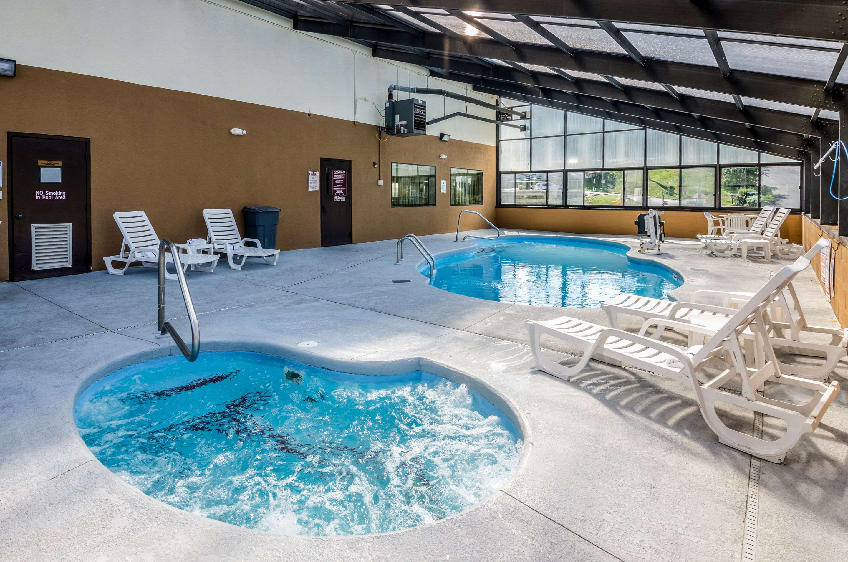Indoor pool with hot tub | Quality Inn & Suites