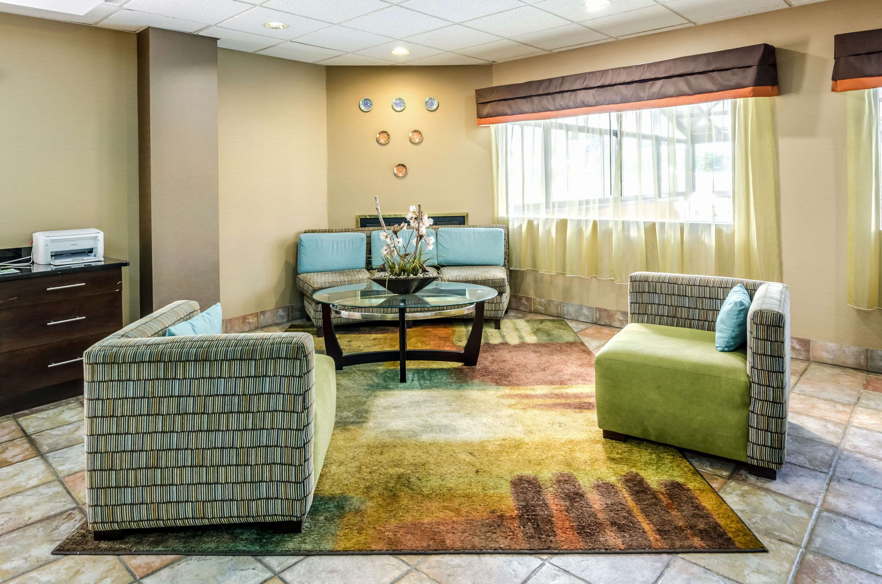 Lobby with sitting area | Quality Inn & Suites
