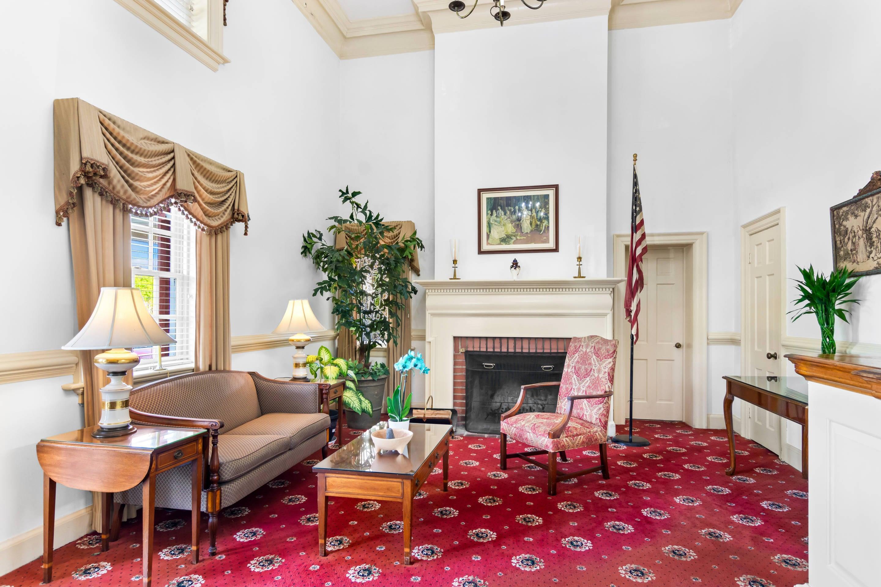 Spacious lobby with sitting area | Rodeway Inn Historic
