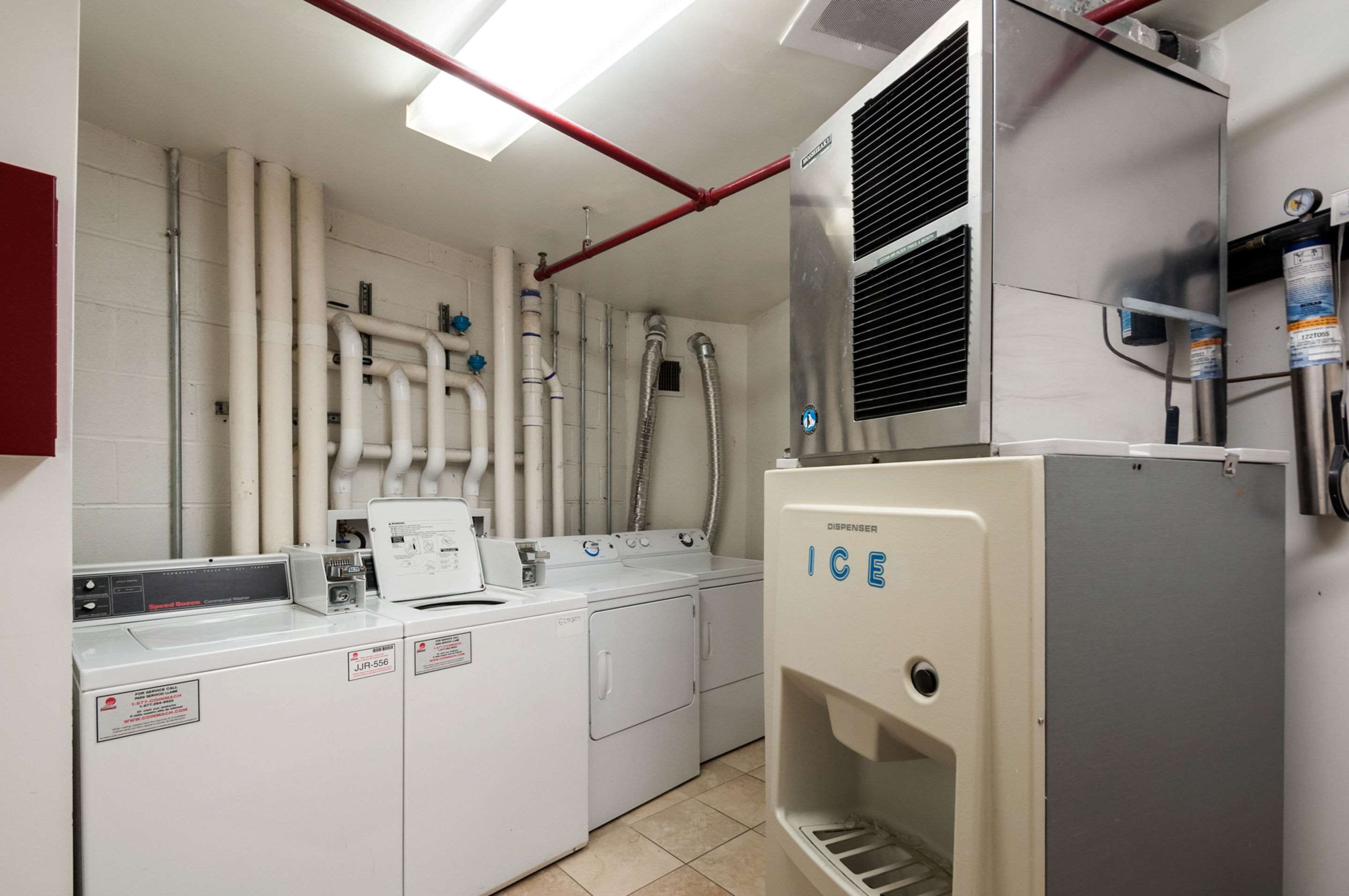 Guest laundry area | Arlington Court Suites, a Clarion Collection Hotel