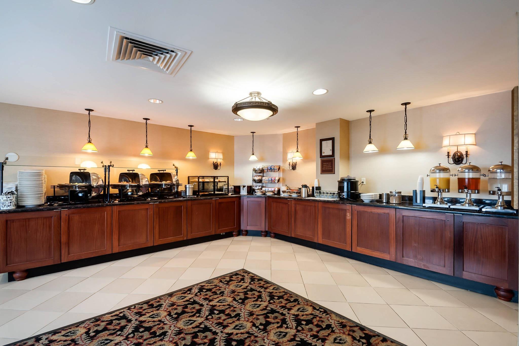 Assorted breakfast items | Arlington Court Suites, a Clarion Collection Hotel