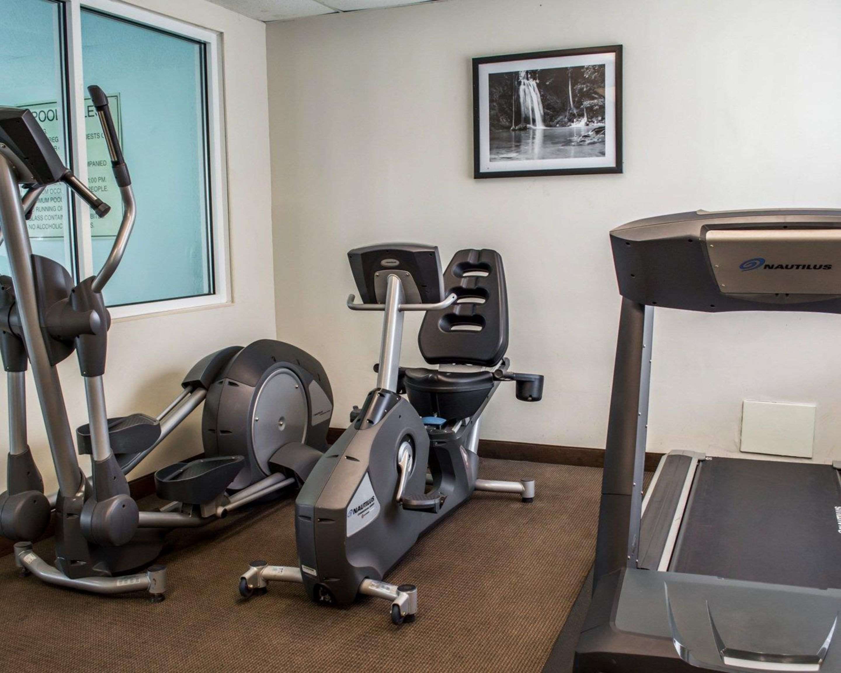 Fitness center with cardio equipment | Sleep Inn Historic