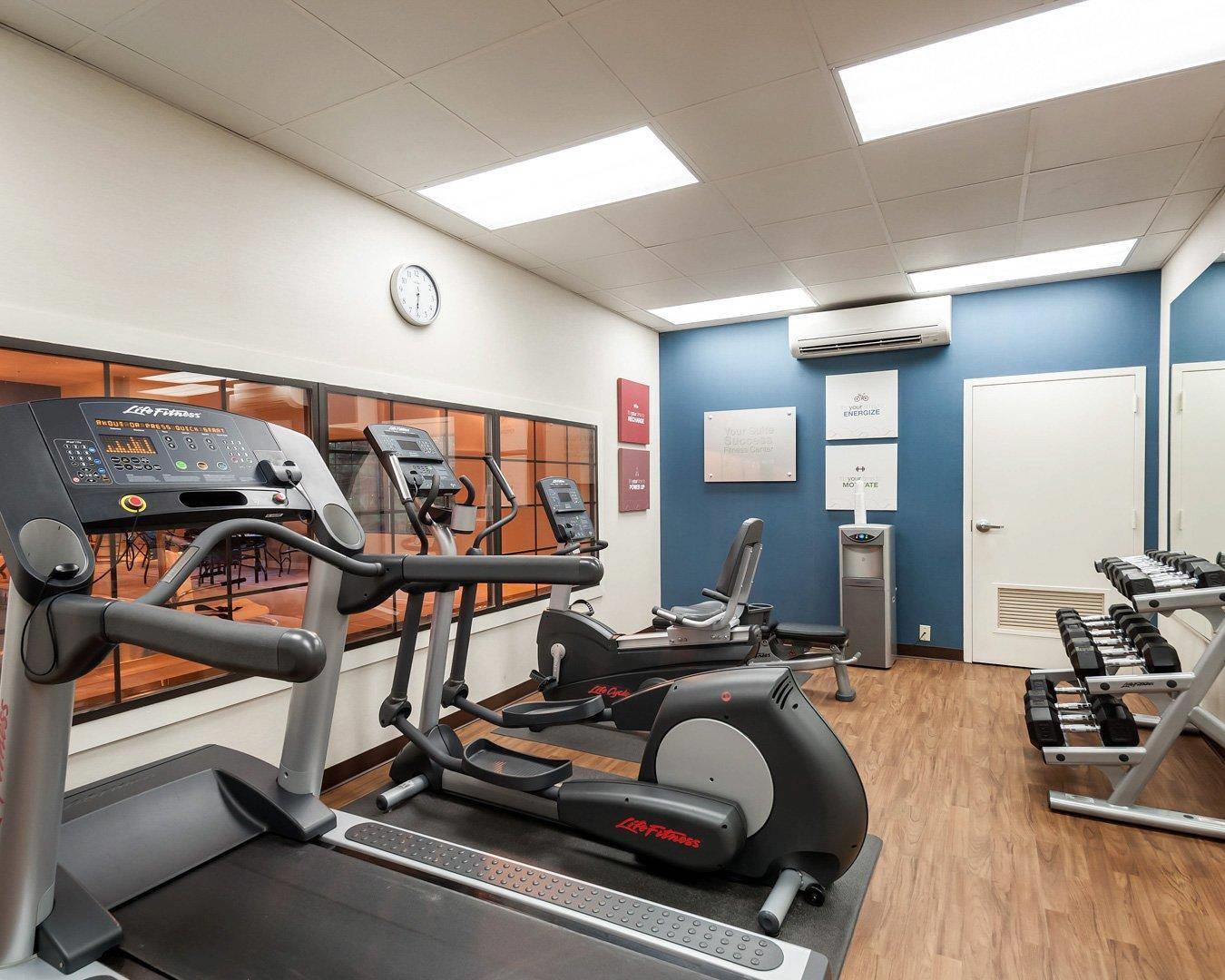 Fitness center with cardio equipment and weights