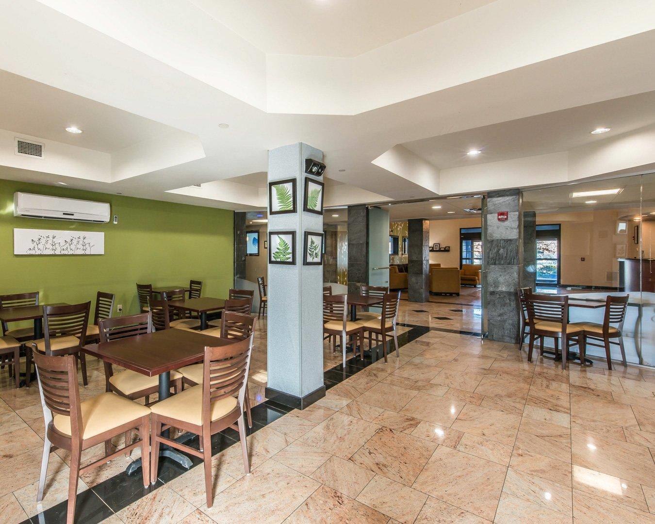 Enjoy breakfast in this seating area | Sleep Inn & Suites