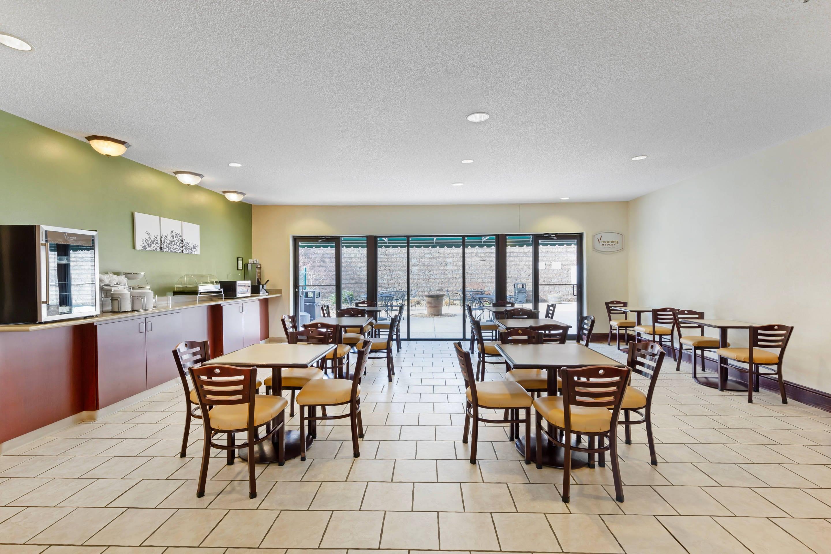 Enjoy breakfast in this seating area | Sleep Inn & Suites Danville Hwy 58