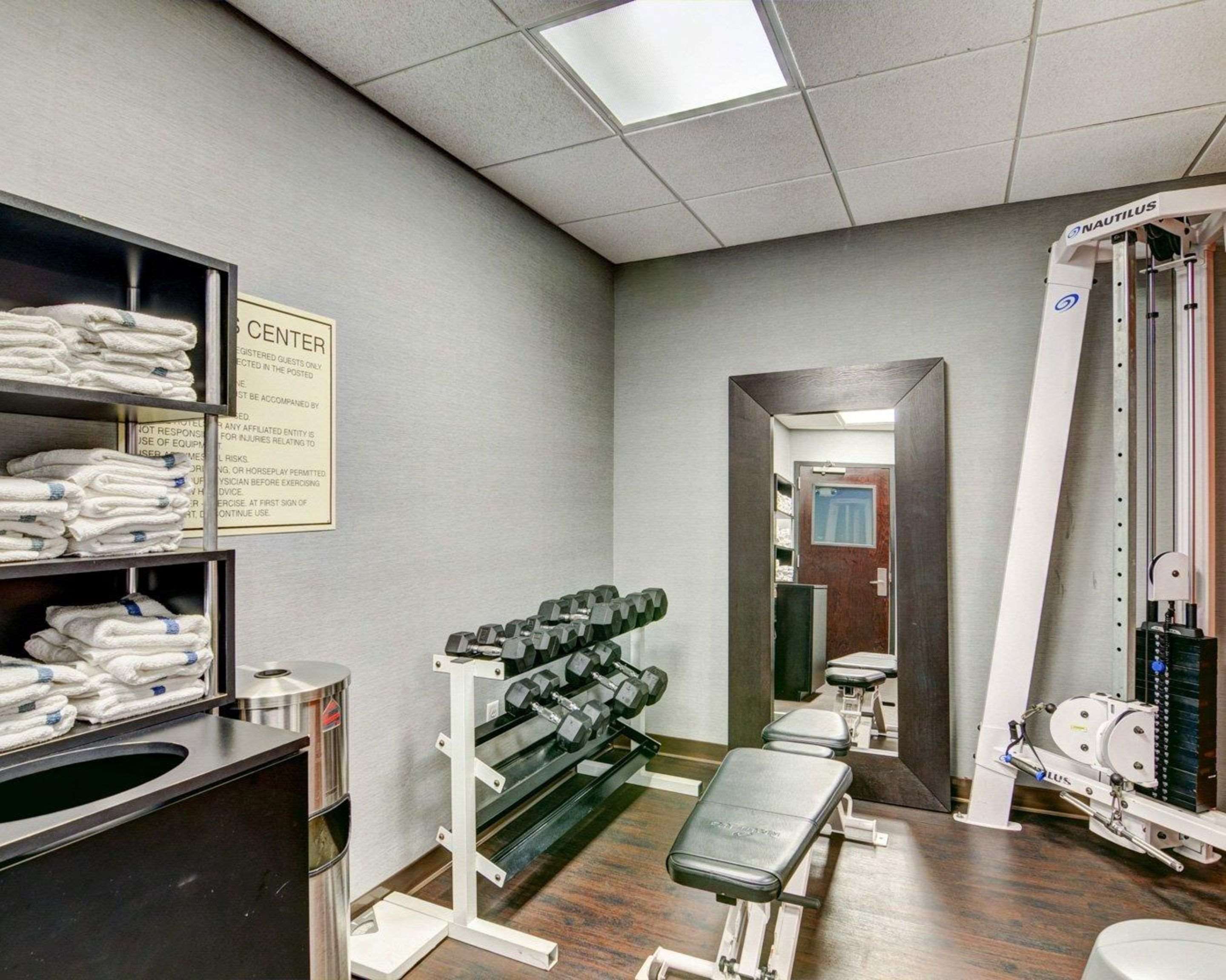 Fitness center with cardio equipment and weights | Comfort Suites Williamsburg Historic Area