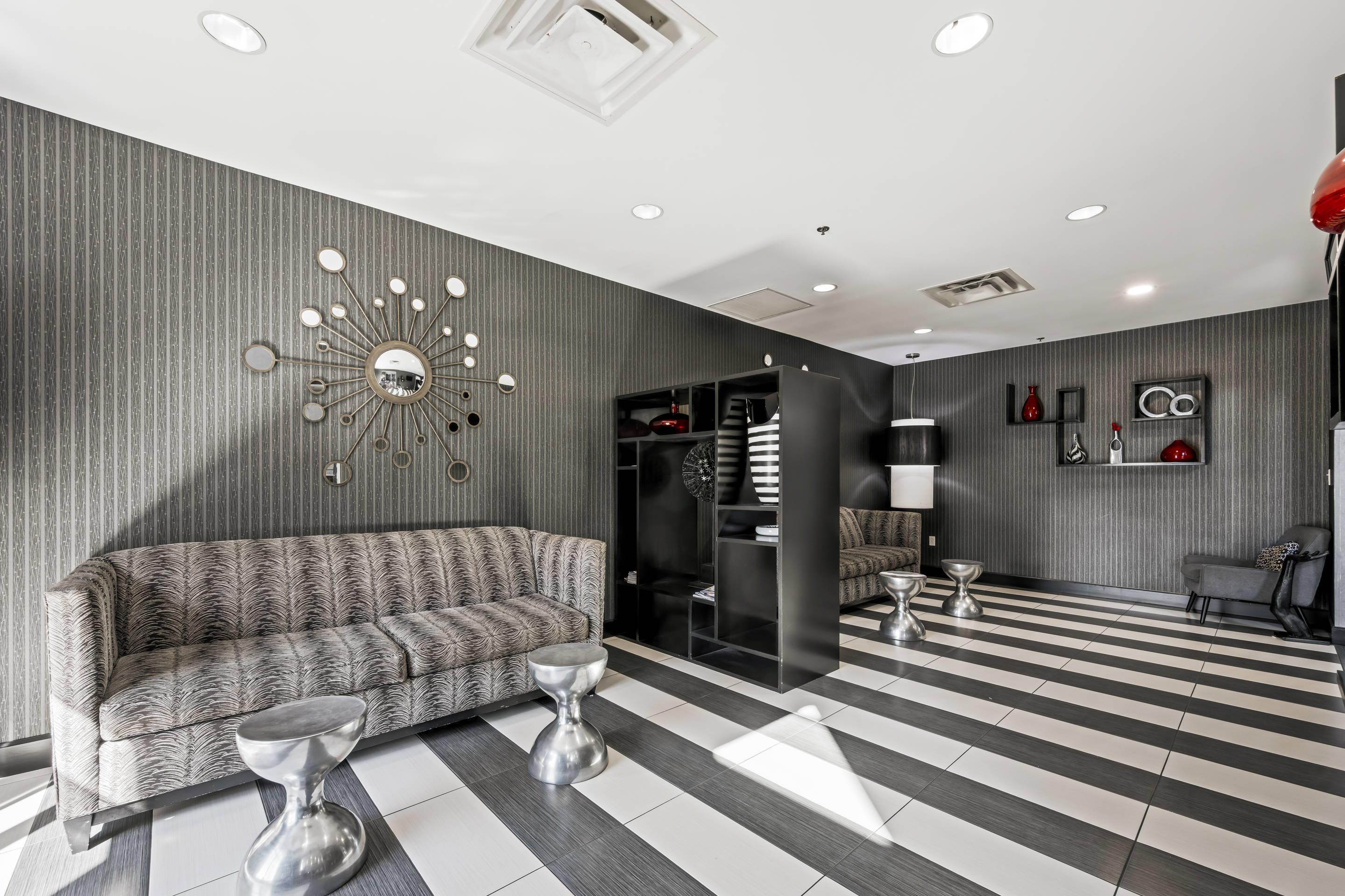 Spacious lobby with sitting area | Comfort Suites Williamsburg Historic Area