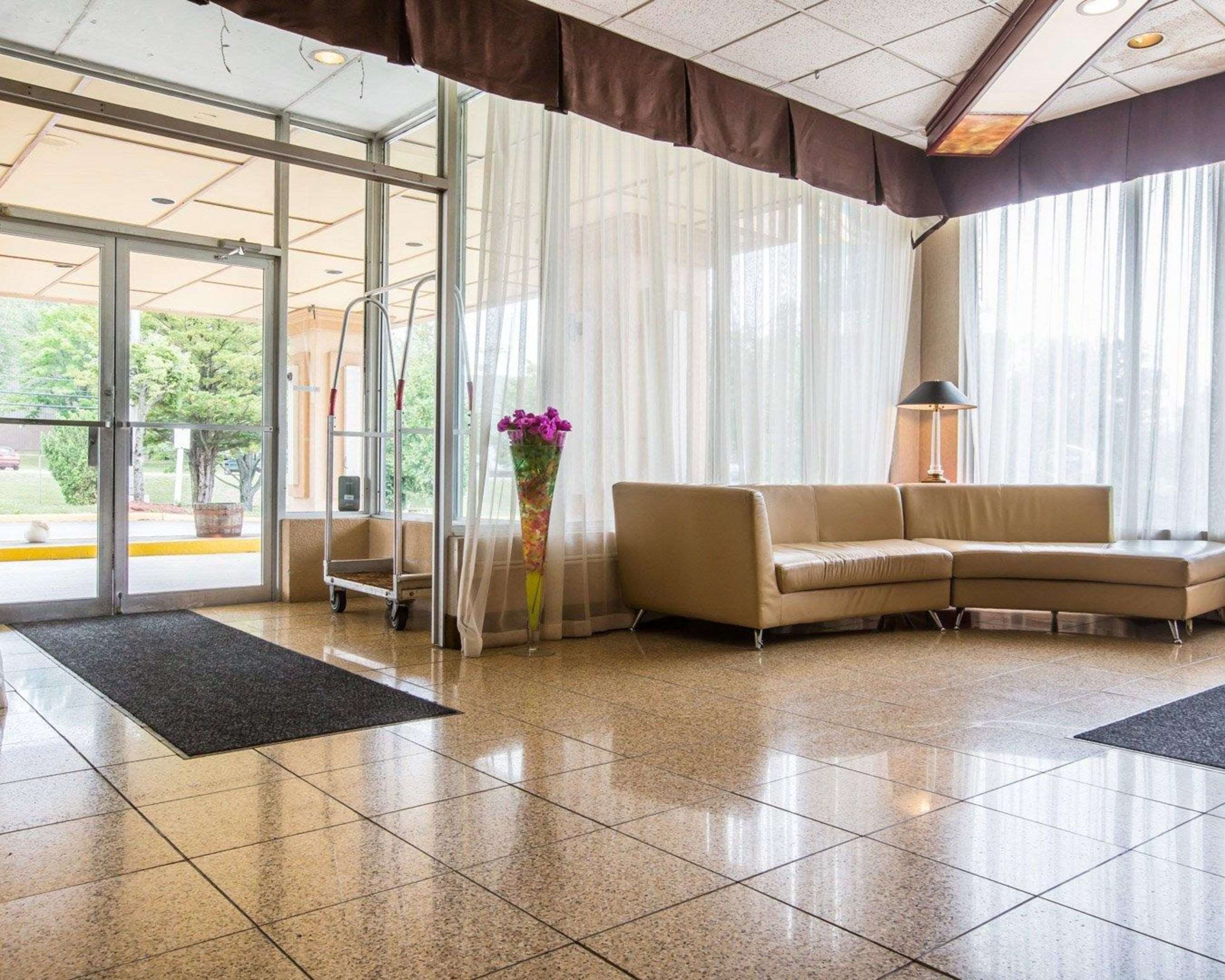 Spacious lobby with sitting area | Quality Inn & Conference Center
