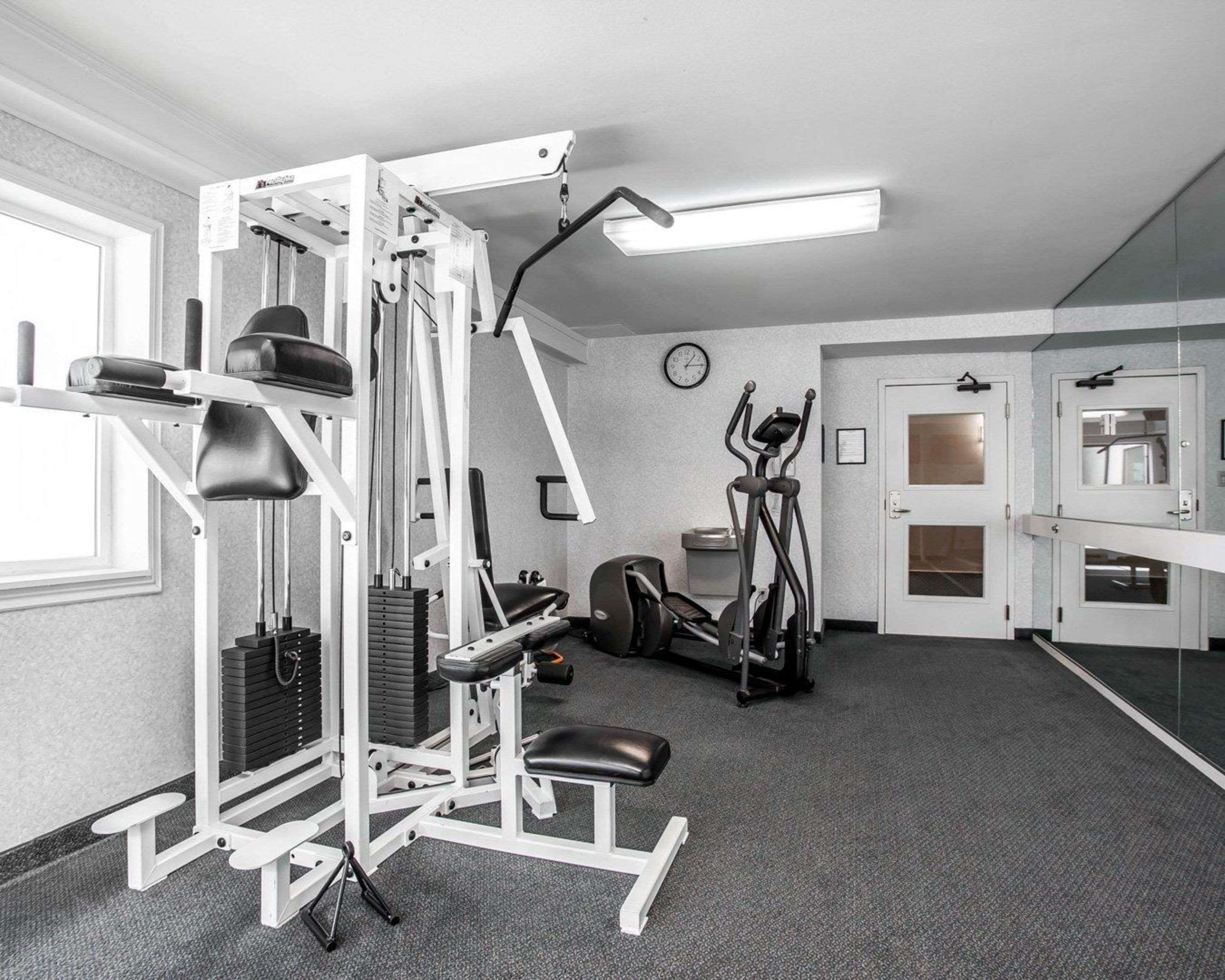 Exercise room with cardio equipment and weights | Comfort Inn Bellingham