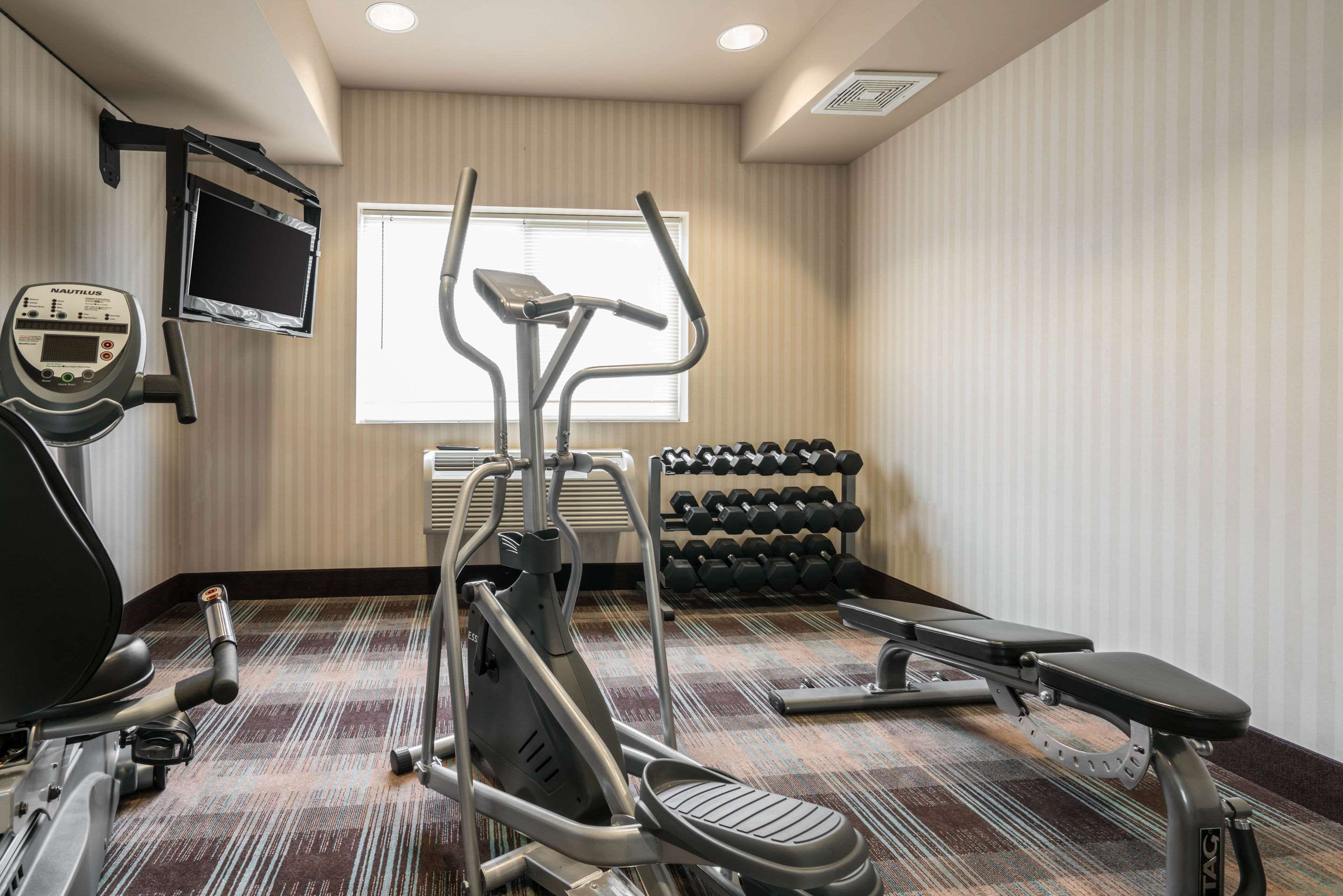 Exercise room with cardio equipment