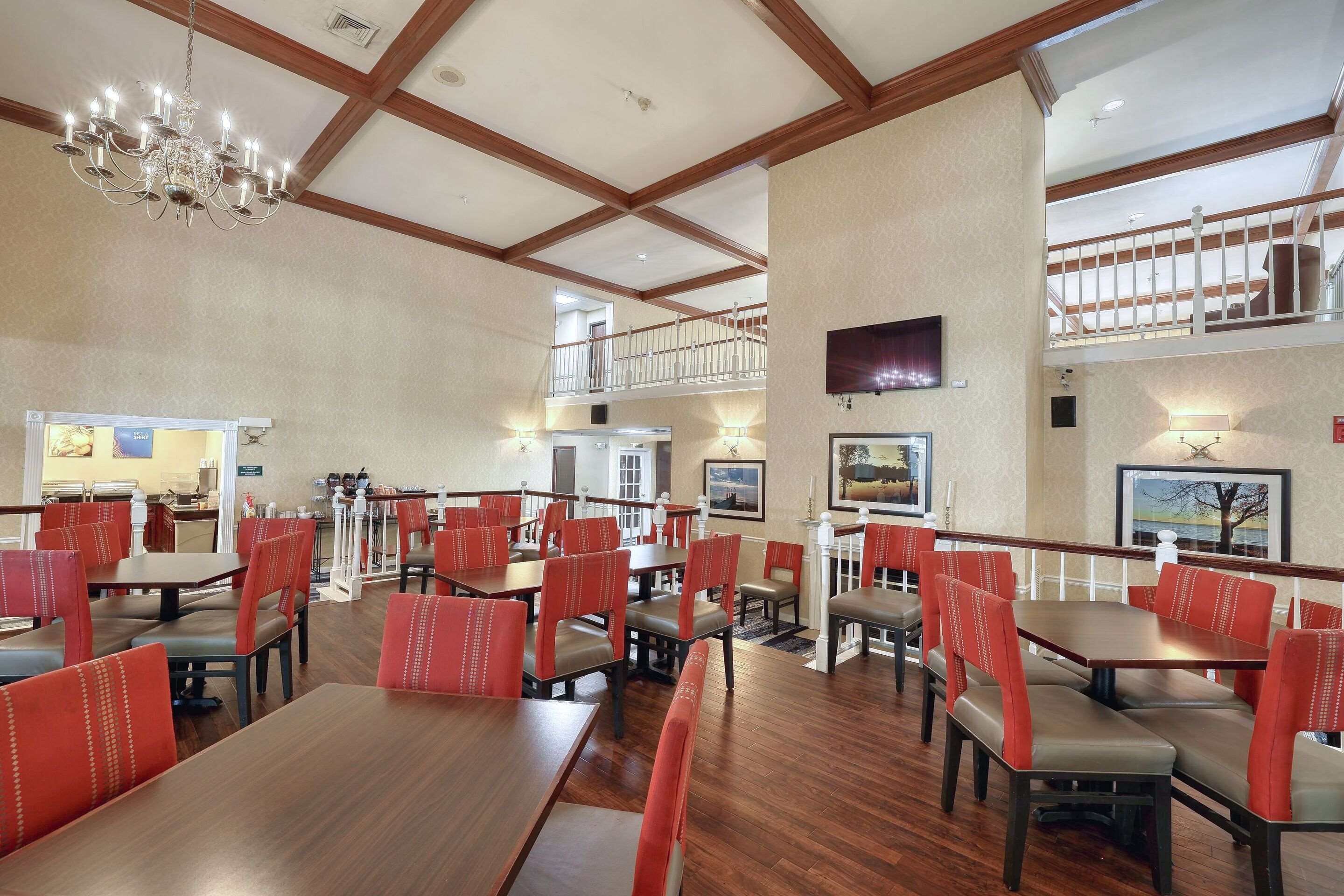 Enjoy breakfast in this seating area | Comfort Suites Appleton Airport