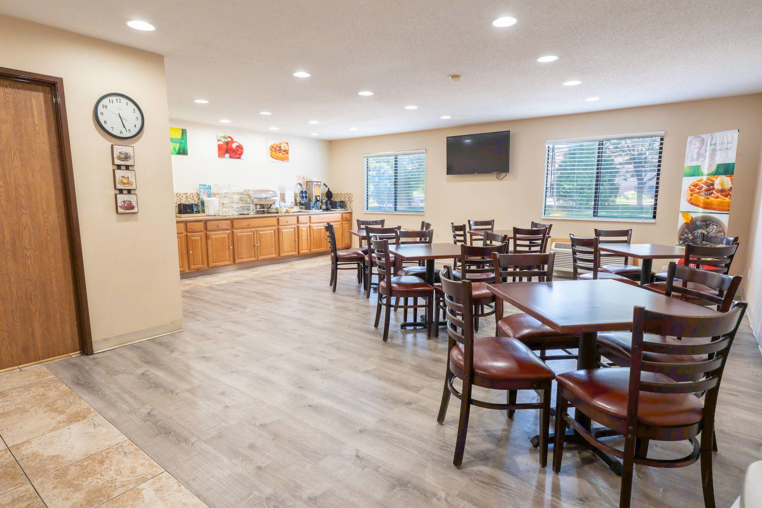 Enjoy breakfast in this seating area | Quality Inn & Suites Sun Prairie Madison East