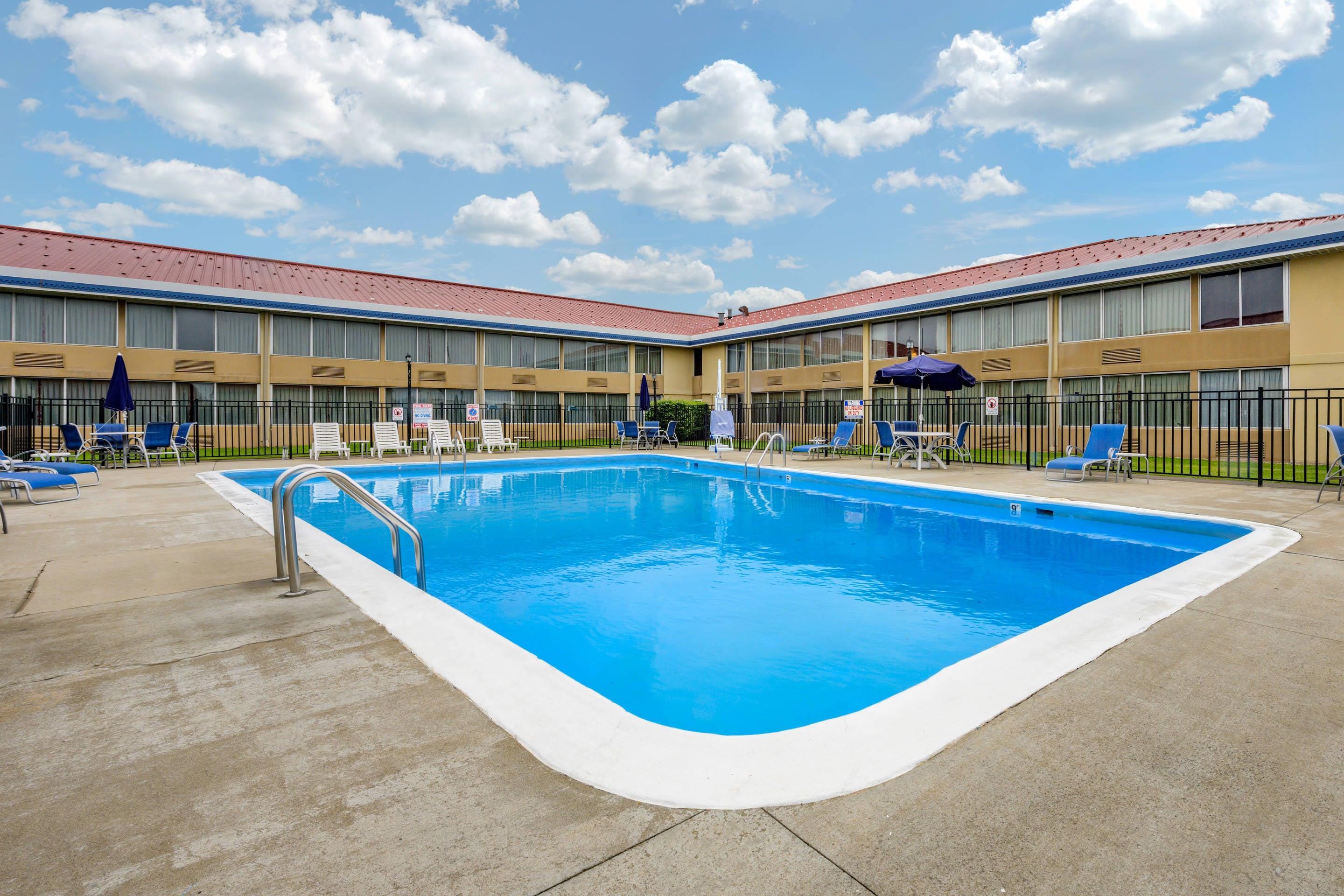 Outdoor pool | Econo Lodge Inn & Suites Triadelphia - Wheeling