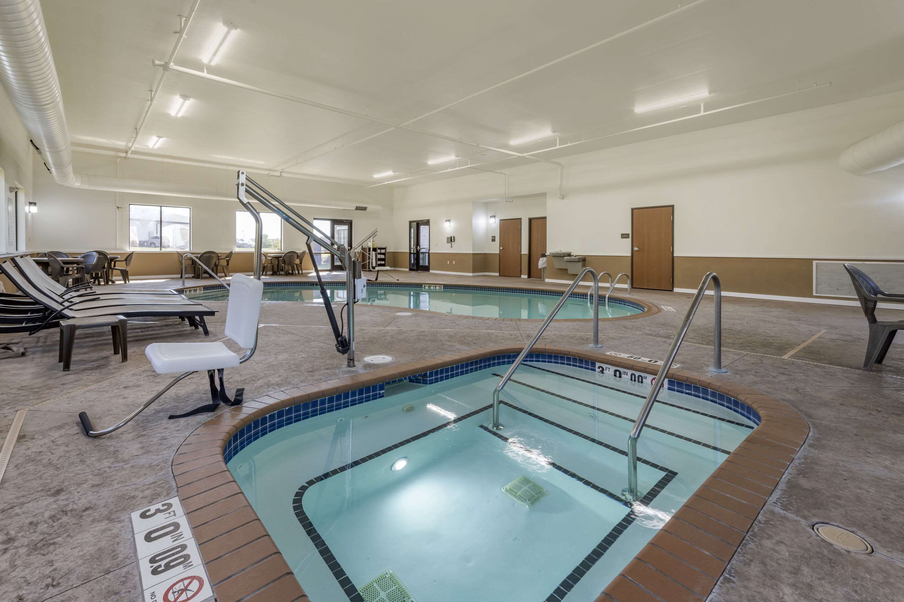 Relax by the pool | Comfort Suites Bridgeport - Clarksburg