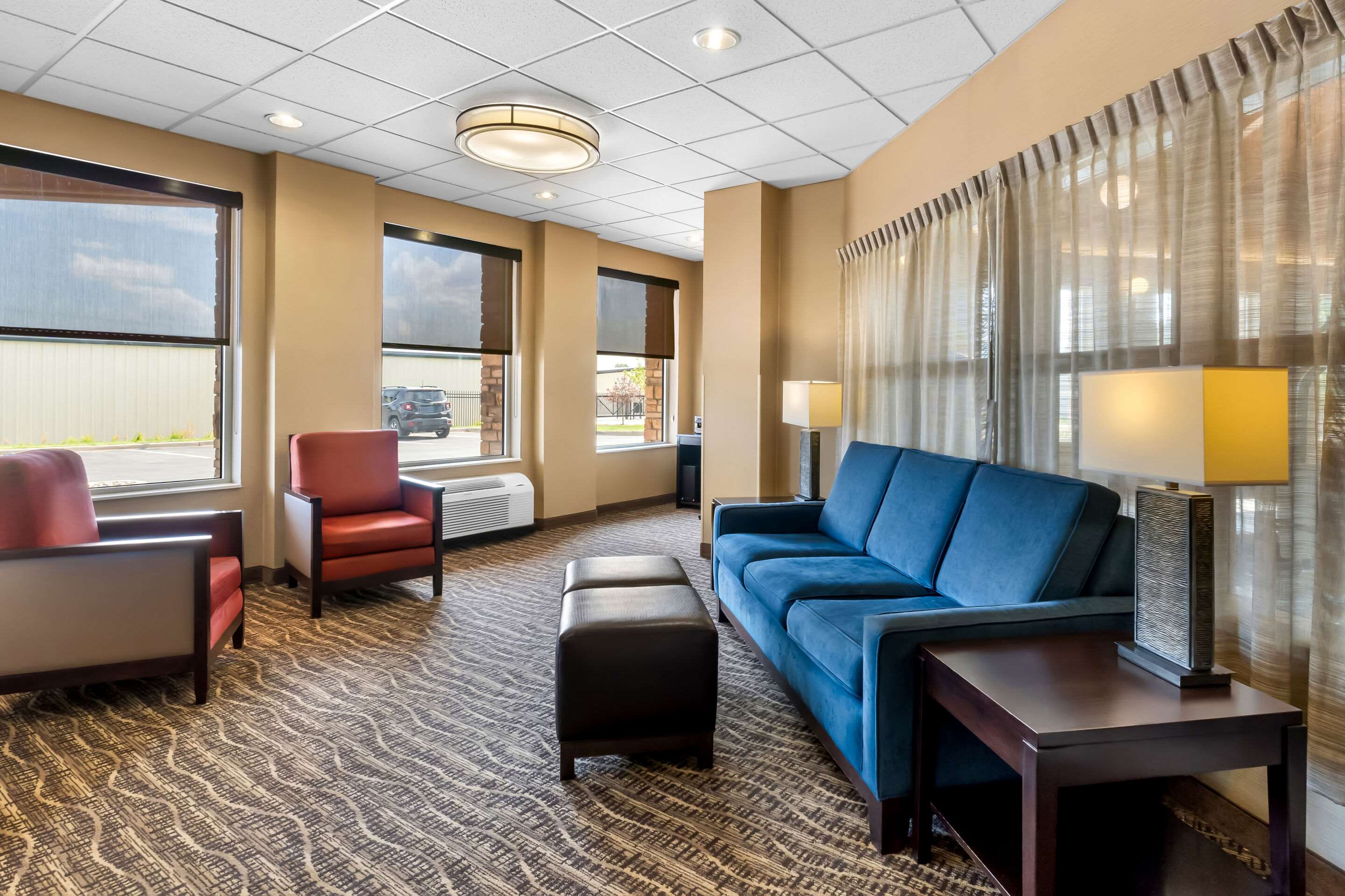 Lobby with sitting area | Comfort Inn & Suites Near University of Wyoming