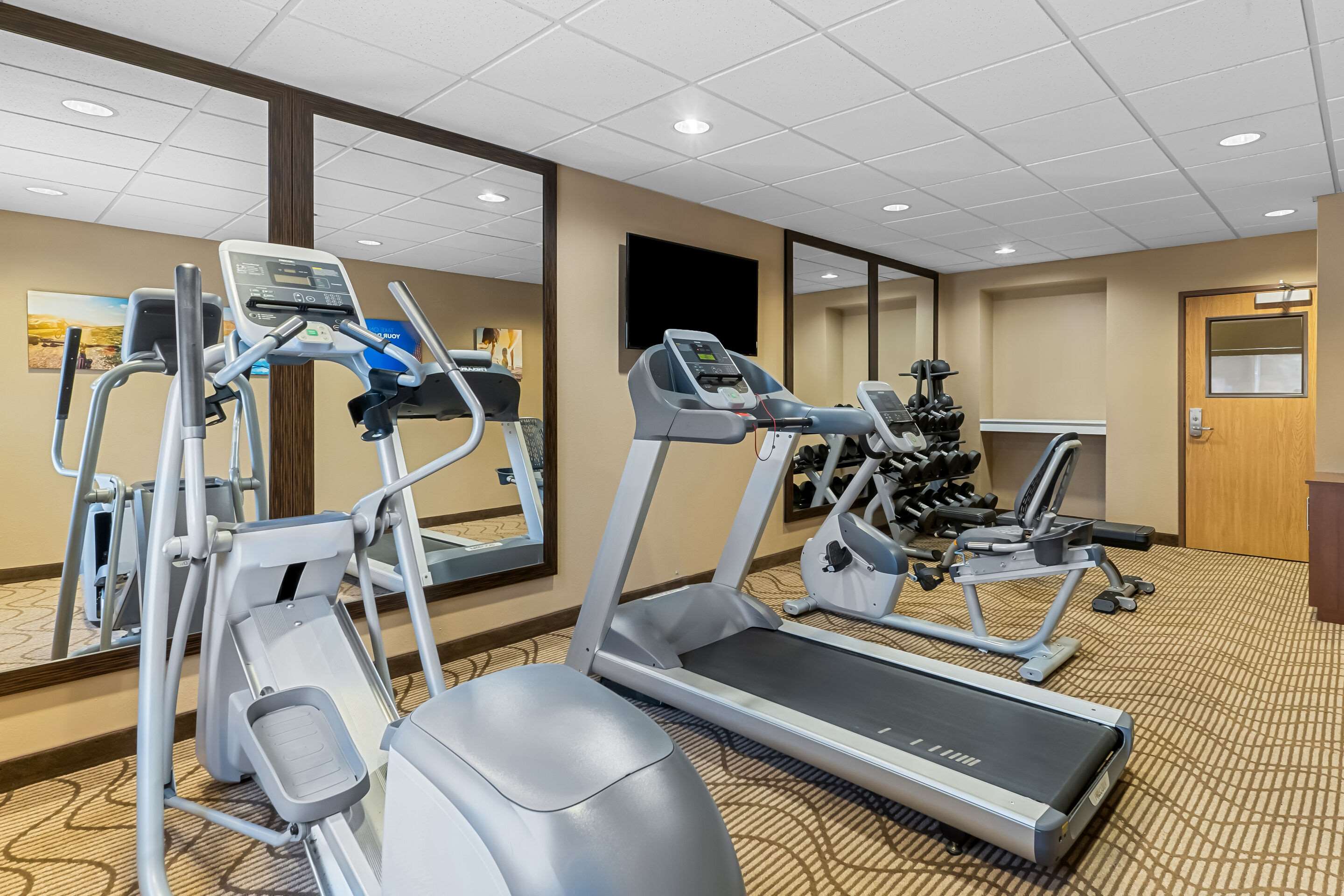 Fitness center | Comfort Inn & Suites Near University of Wyoming