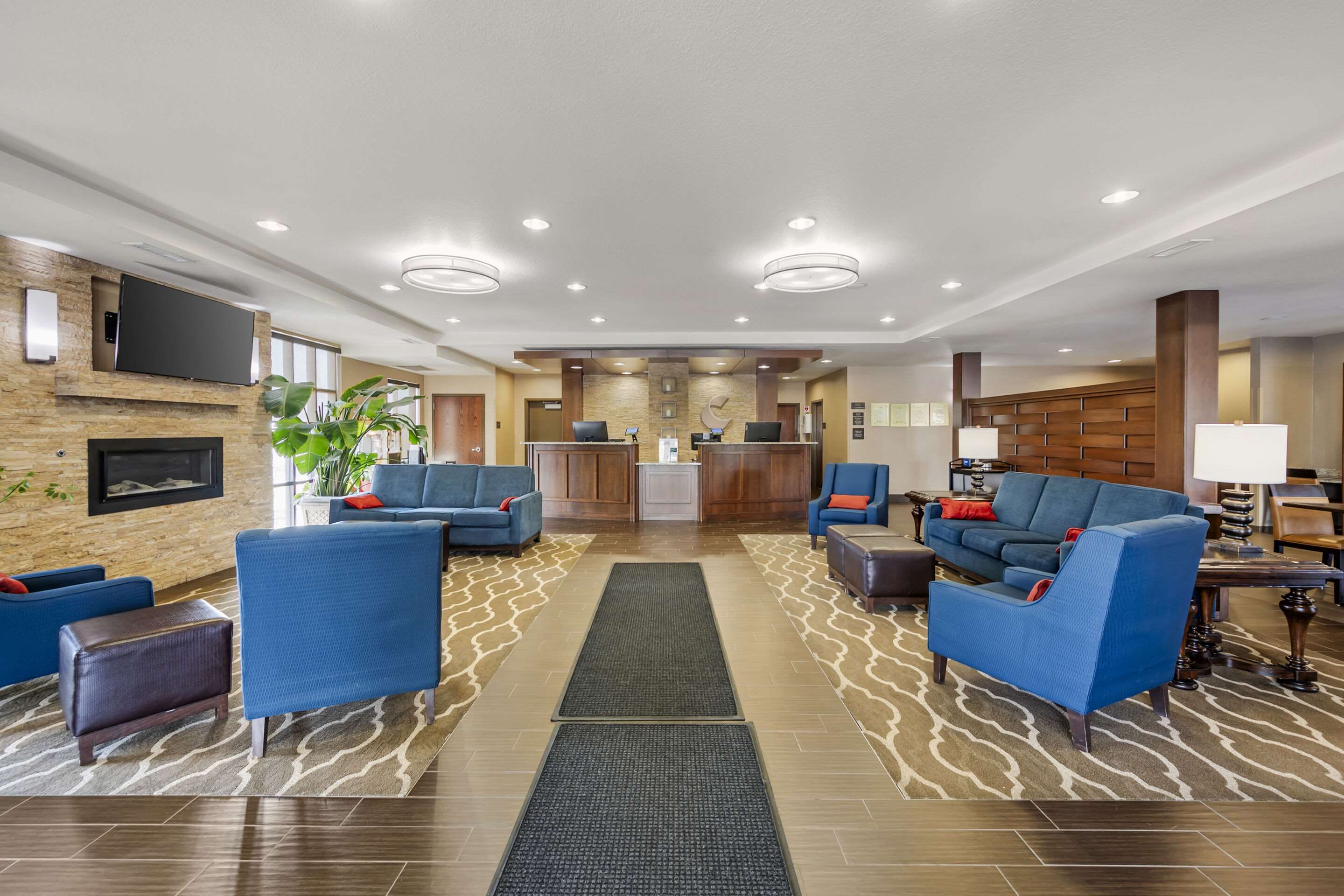 Spacious lobby with sitting area | Comfort Inn & Suites